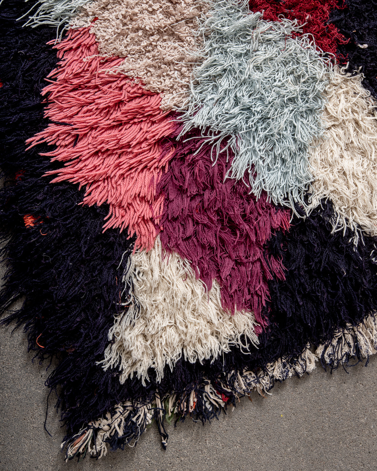 Modern designer vintage handcrafted Berber rug from Morocco. Boucherouite runner rug with beautiful colors and patterns.