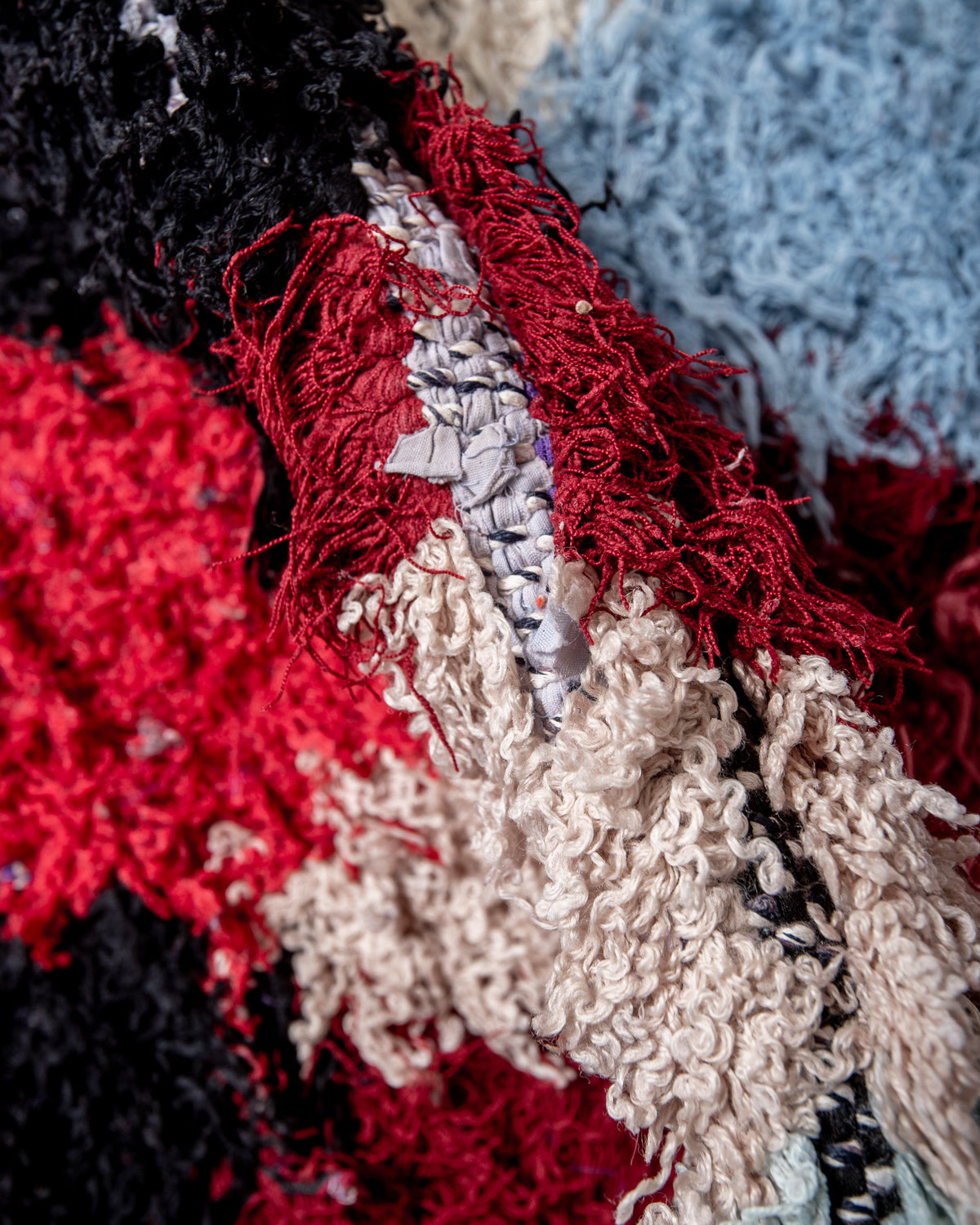 Modern designer vintage handcrafted Berber rug from Morocco. Boucherouite runner rug with beautiful colors and patterns.