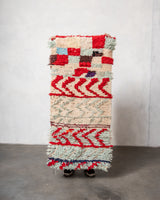 Modern designer vintage handcrafted Berber rug from Morocco. Boucherouite runner rug with beautiful colors and patterns.