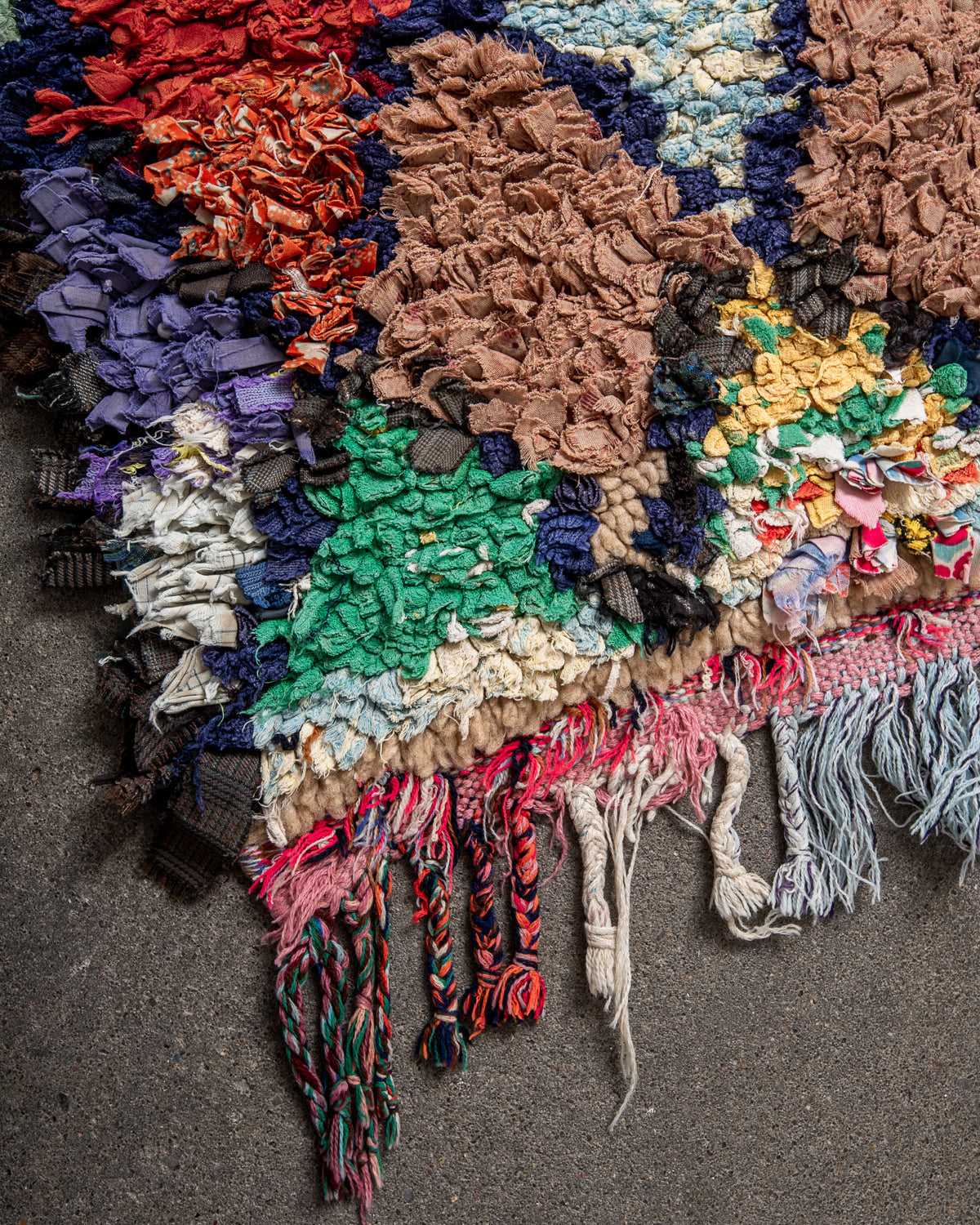 Modern designer vintage handcrafted Berber rug from Morocco. Boucherouite runner rug with beautiful colors and patterns.