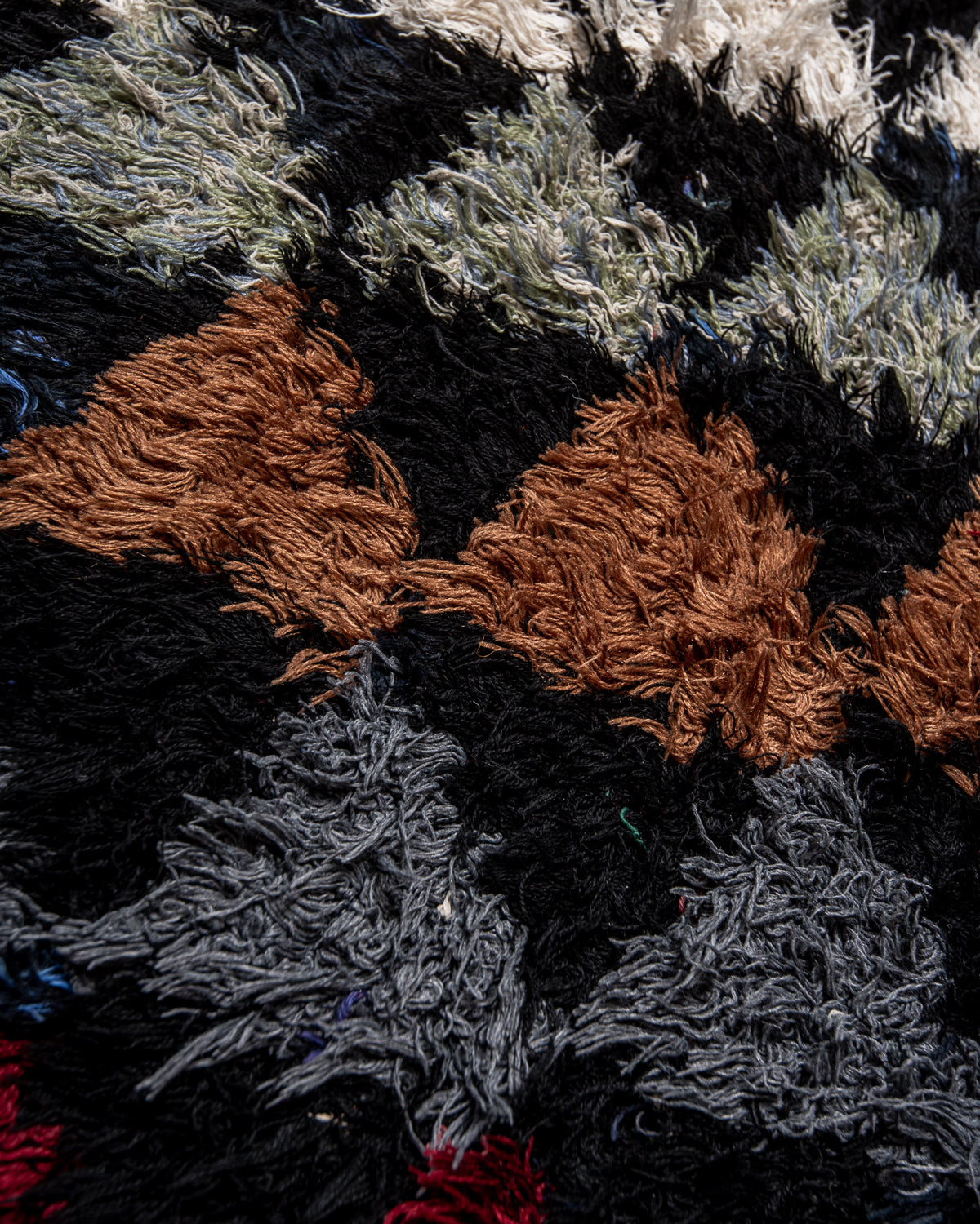 Modern designer vintage handcrafted Berber rug from Morocco. Boucherouite runner rug with beautiful colors and patterns.