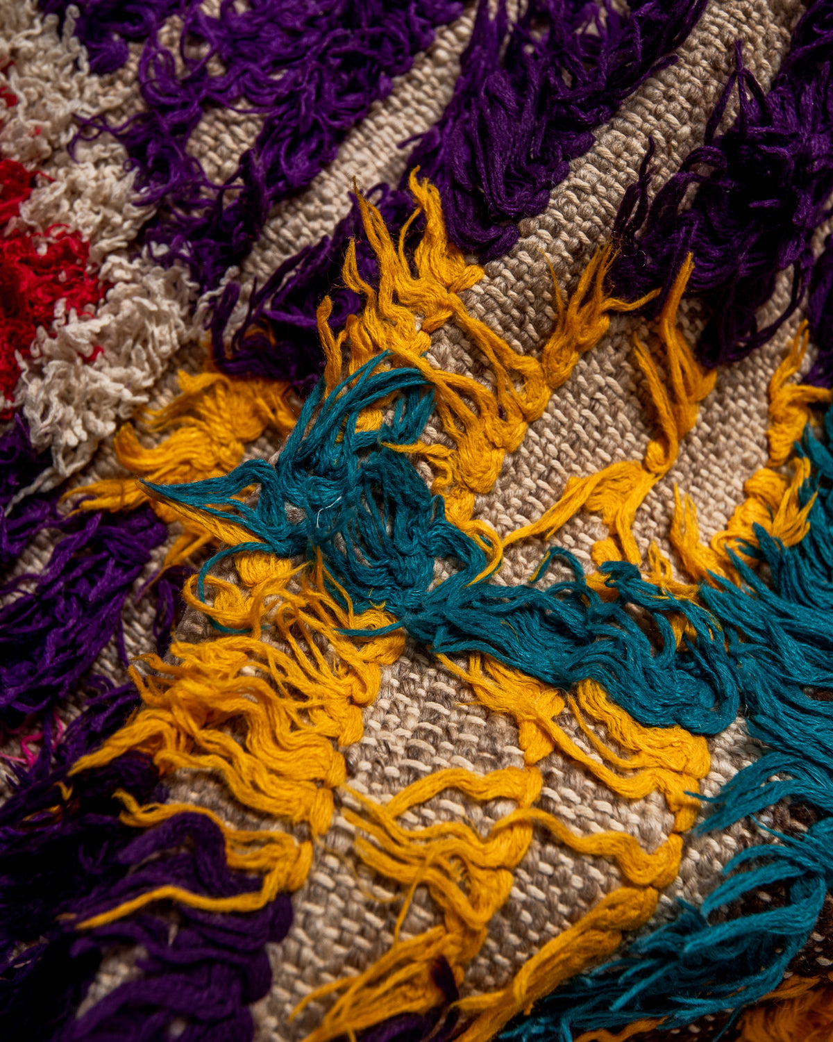 Modern designer vintage handcrafted Berber rug from Morocco. Boucherouite runner rug with beautiful colors and patterns.