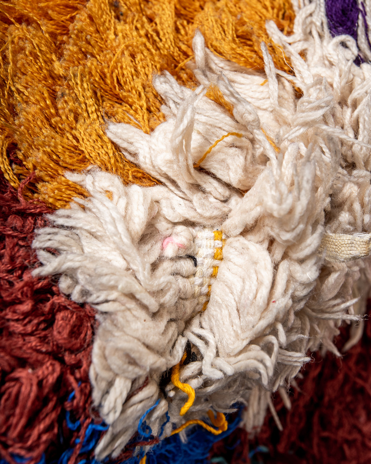 Modern designer vintage handcrafted Berber rug from Morocco. Boucherouite runner rug with beautiful colors and patterns.