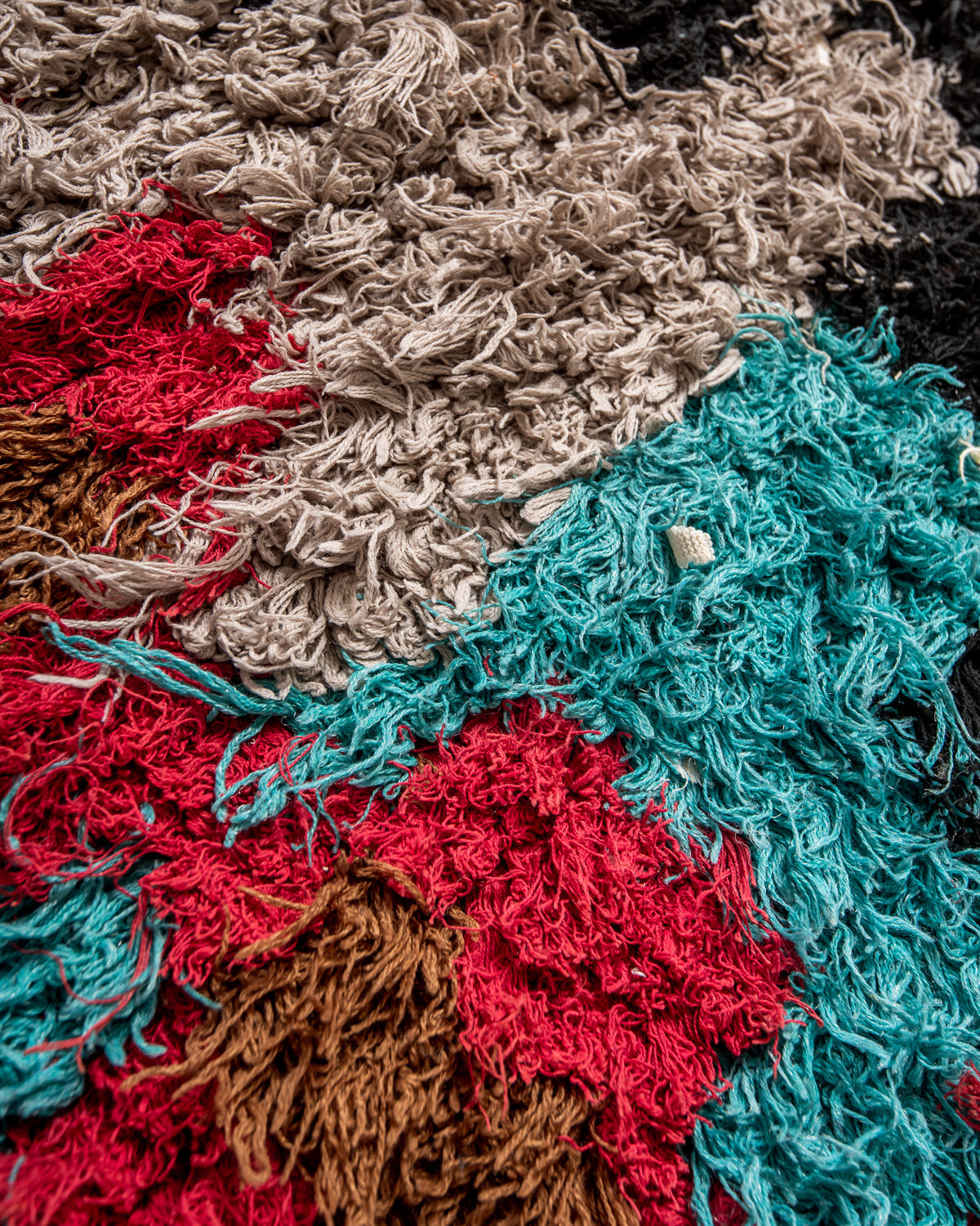 Modern designer vintage handcrafted Berber rug from Morocco. Boucherouite runner rug with beautiful colors and patterns.