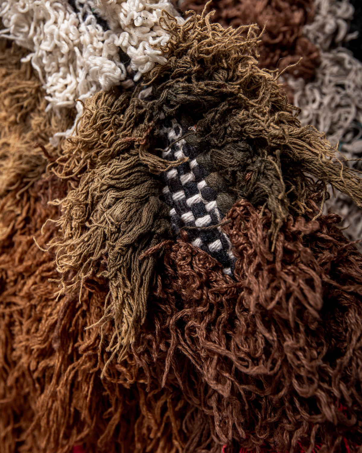 Modern designer vintage handcrafted Berber rug from Morocco. Boucherouite runner rug with beautiful colors and patterns.