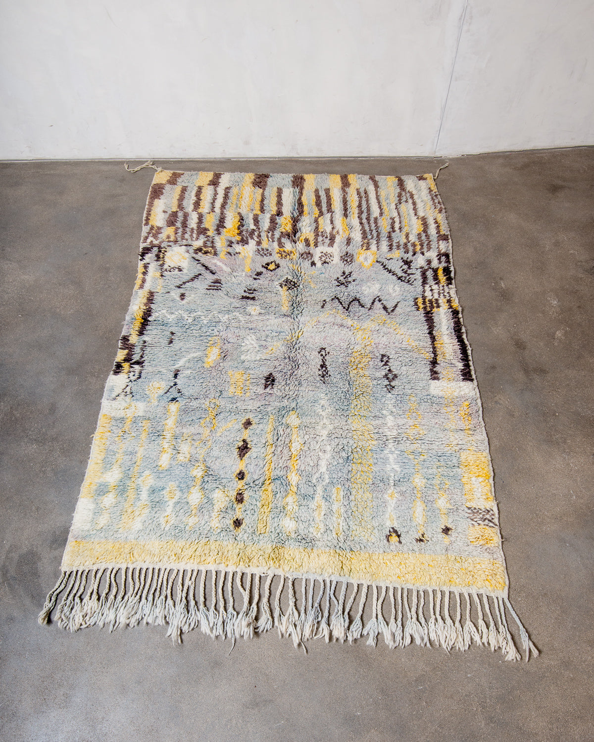 Modern, designer, handcrafted Berber rug from Morocco. Vintage carpet with beautiful colours and patterns and fluffy texture.