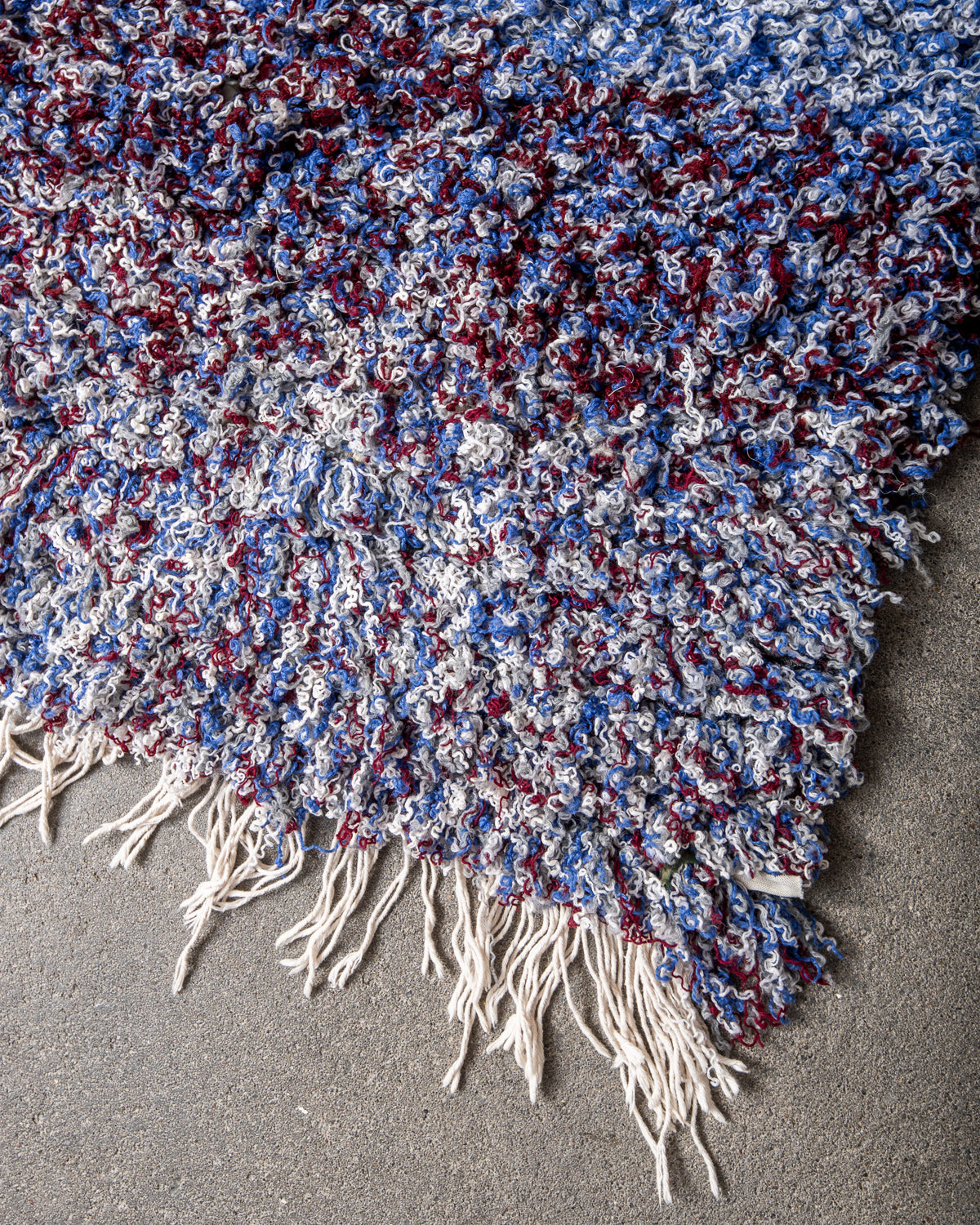 Modern designer vintage handcrafted Berber rug from Morocco. Boucherouite runner rug with beautiful colors and patterns.