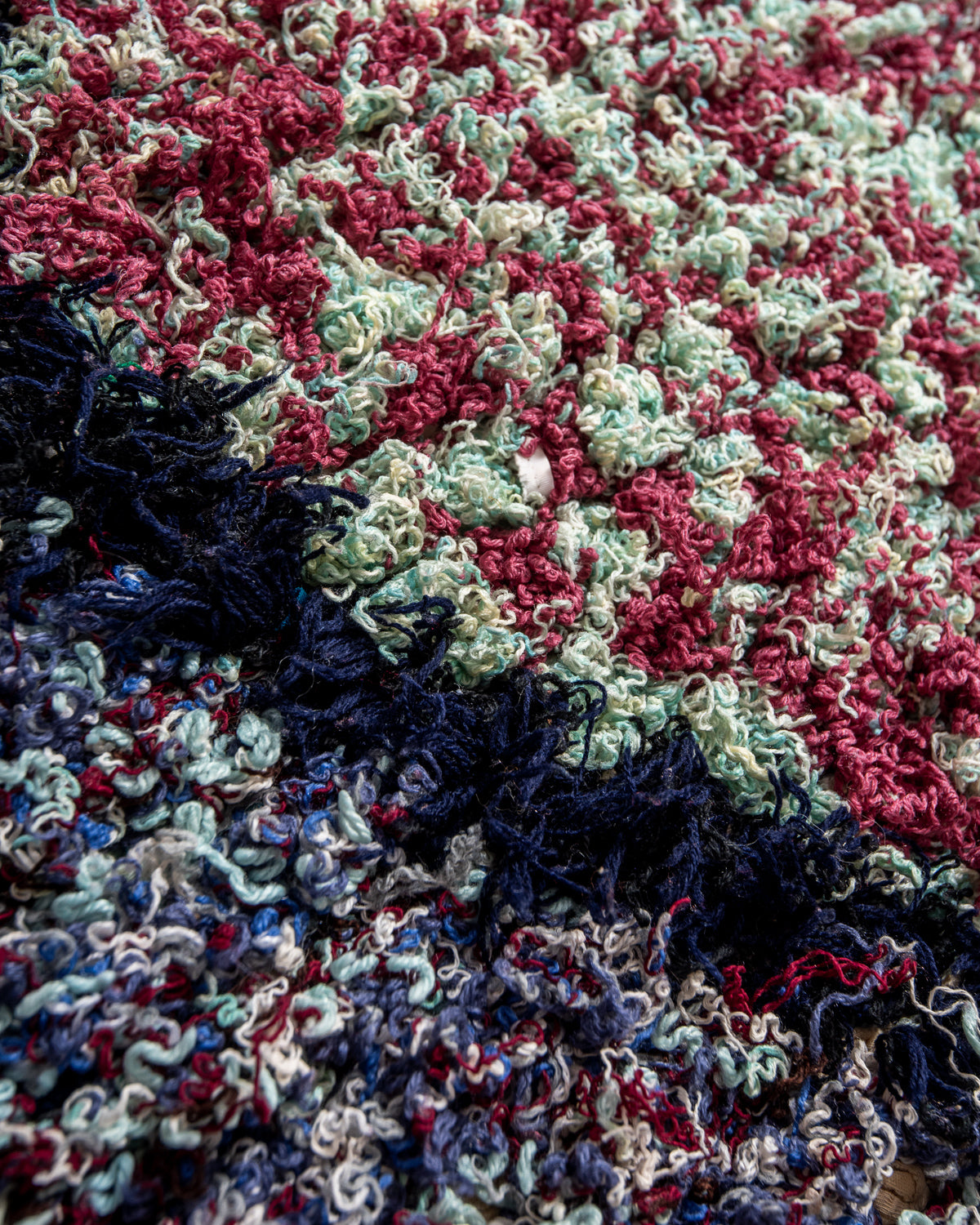 Modern designer vintage handcrafted Berber rug from Morocco. Boucherouite runner rug with beautiful colors and patterns.