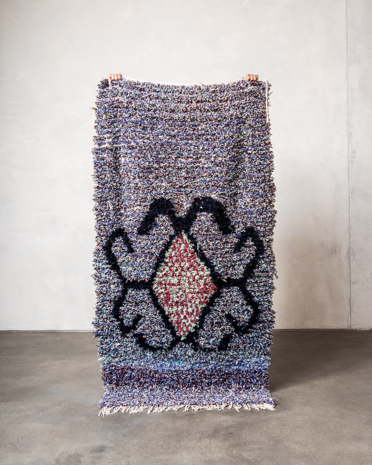 Modern designer vintage handcrafted Berber rug from Morocco. Boucherouite runner rug with beautiful colors and patterns.