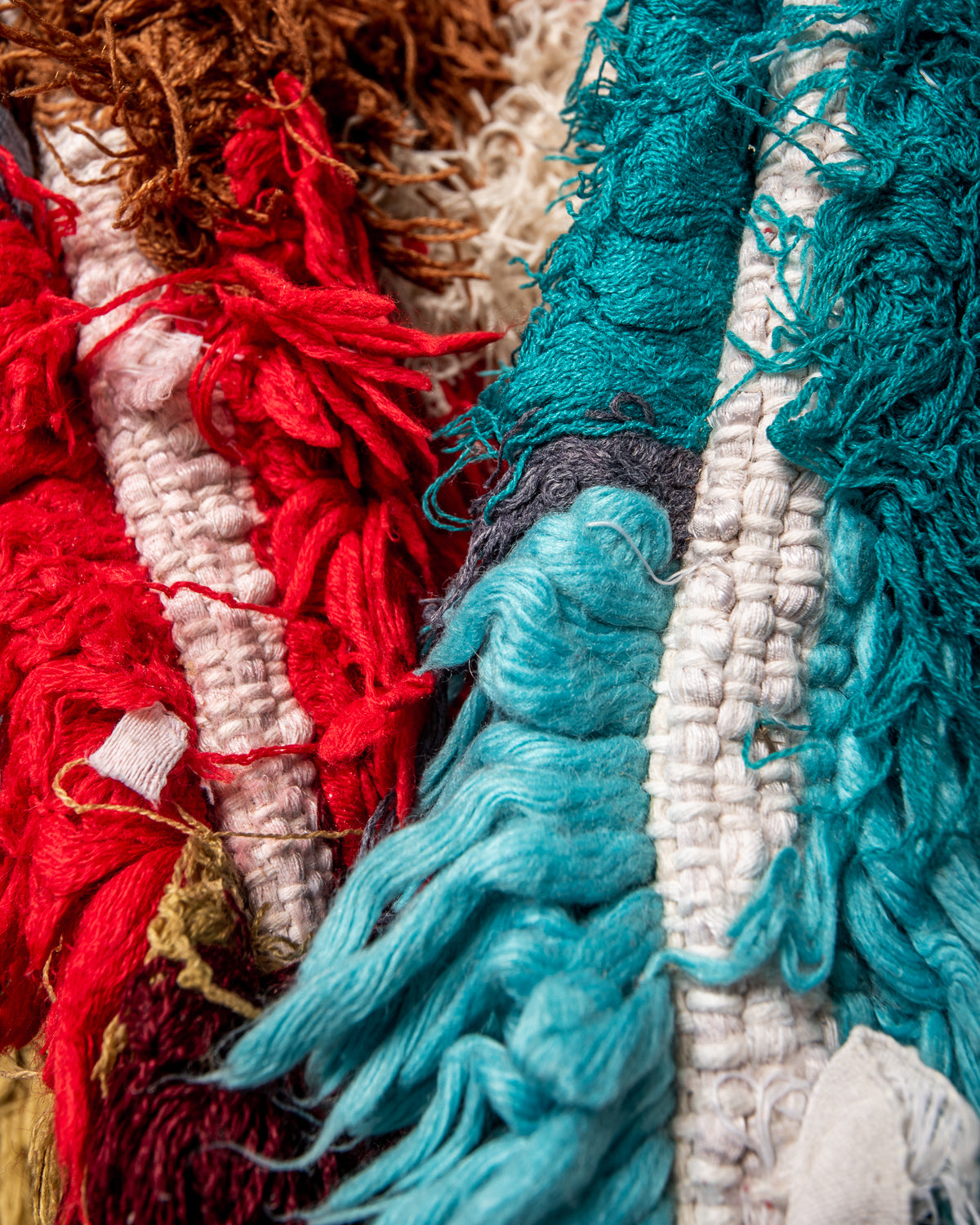 Modern designer vintage handcrafted Berber rug from Morocco. Boucherouite runner rug with beautiful colors and patterns.