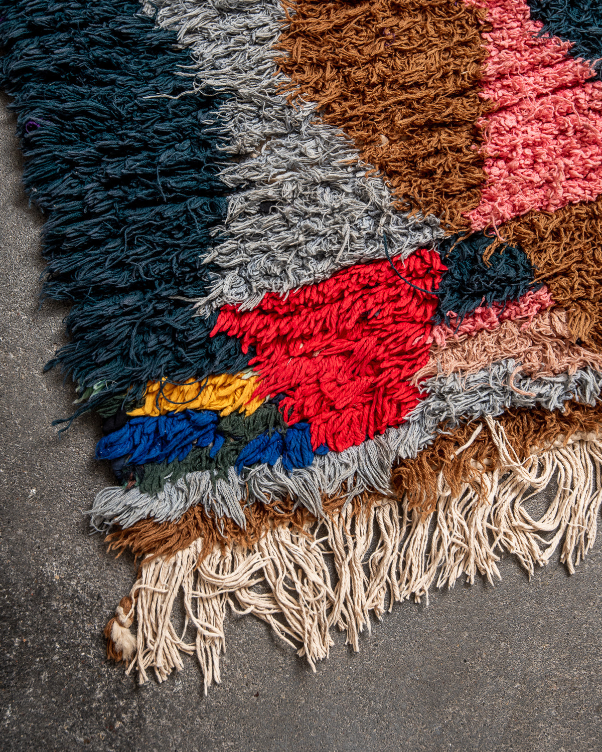 Modern designer vintage handcrafted Berber rug from Morocco. Boucherouite runner rug with beautiful colors and patterns.