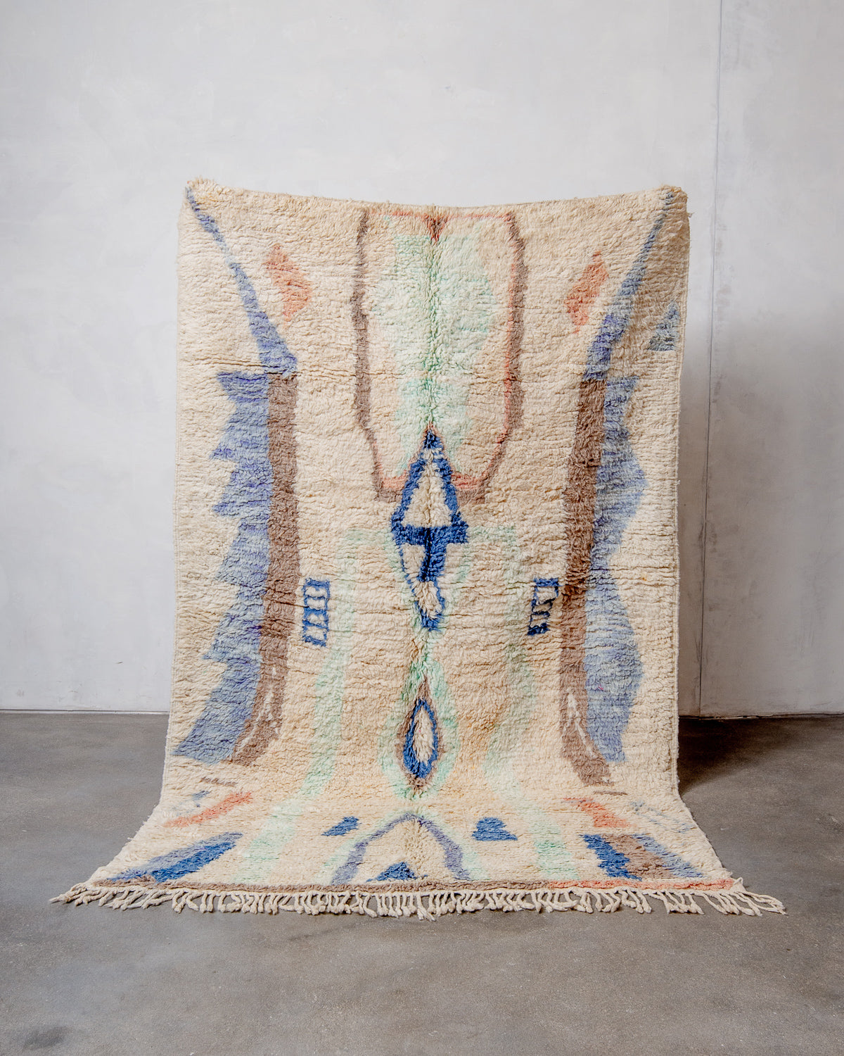 Modern, designer, handcrafted Berber rug from Morocco. Vintage carpet with beautiful colours and patterns and fluffy texture.