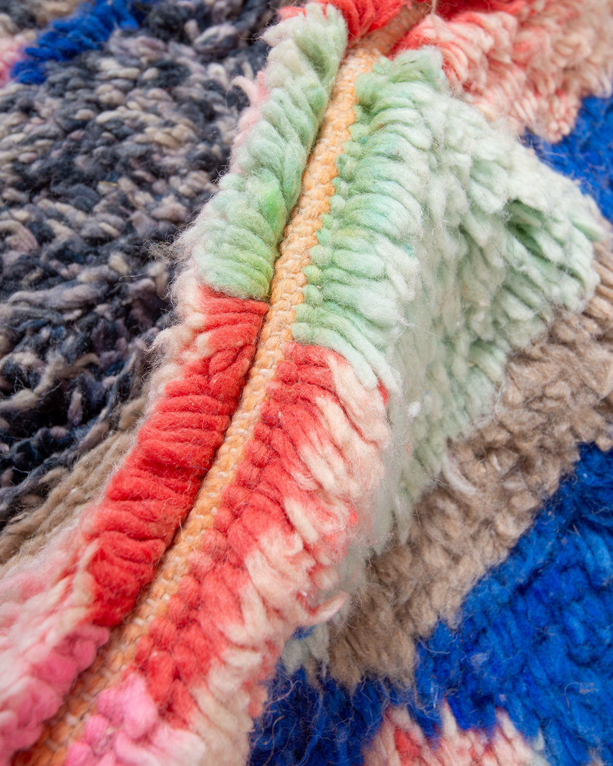 Modern, designer, handcrafted Berber rug from Morocco. Vintage carpet with beautiful colours and patterns and fluffy texture.