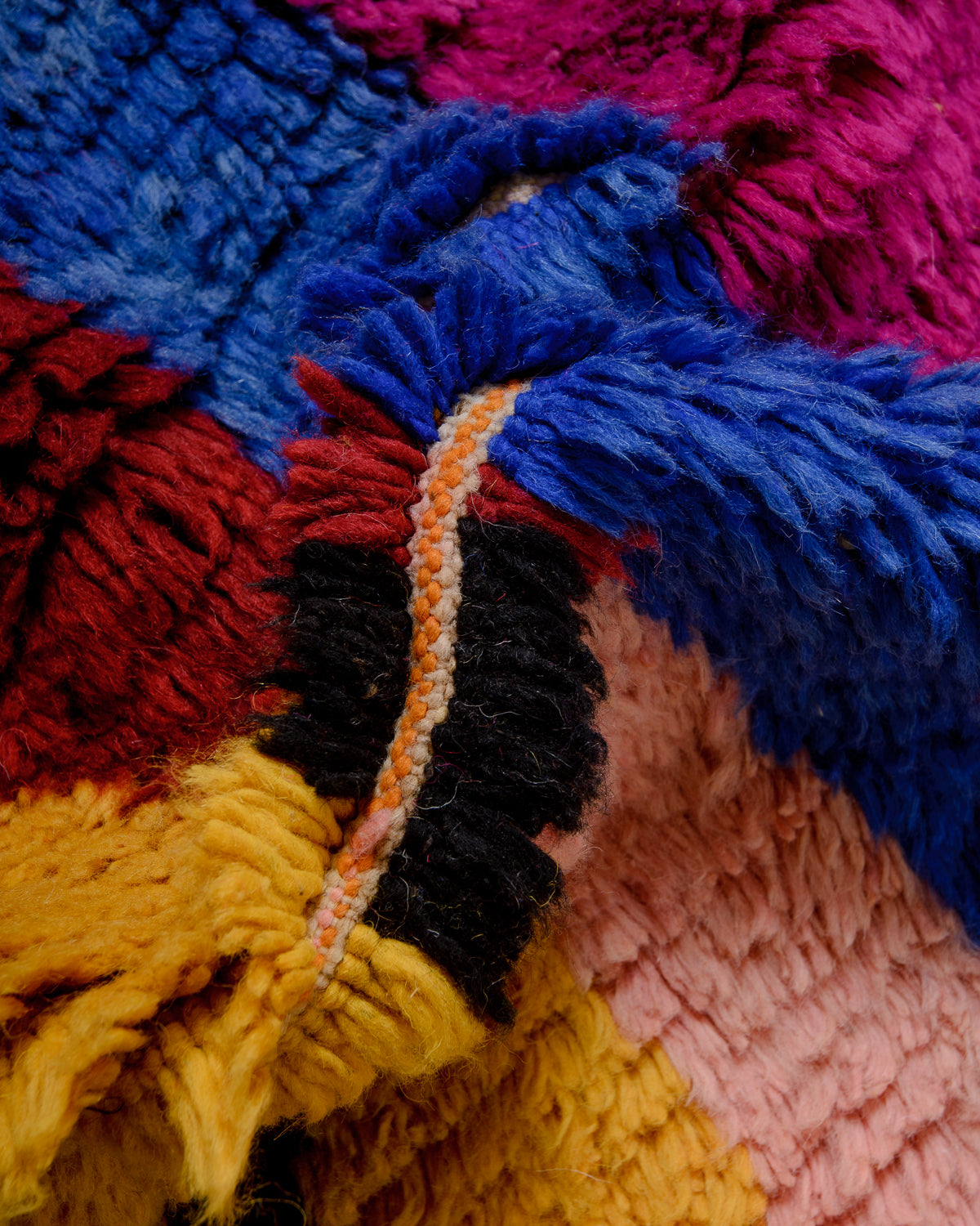 Modern, designer, handcrafted Berber rug from Morocco. Vintage carpet with beautiful colours and patterns and fluffy texture.