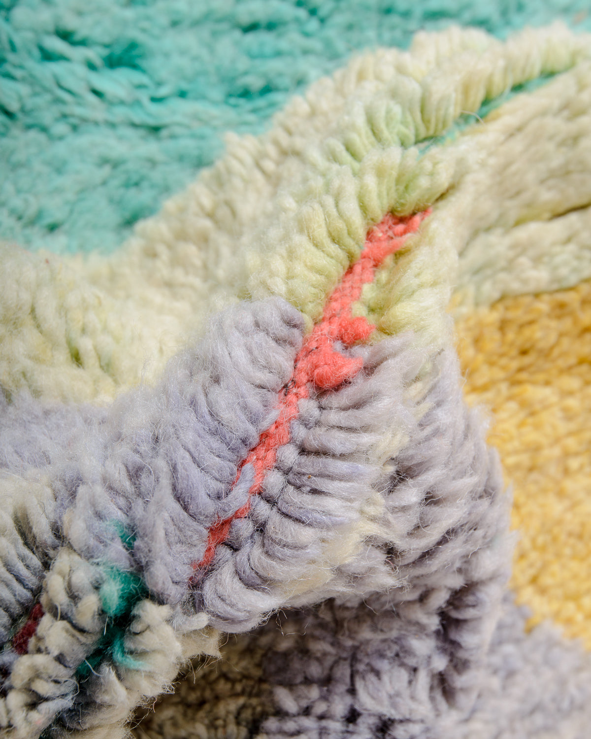 Modern, designer, handcrafted Berber rug from Morocco. Vintage carpet with beautiful colours and patterns and fluffy texture.