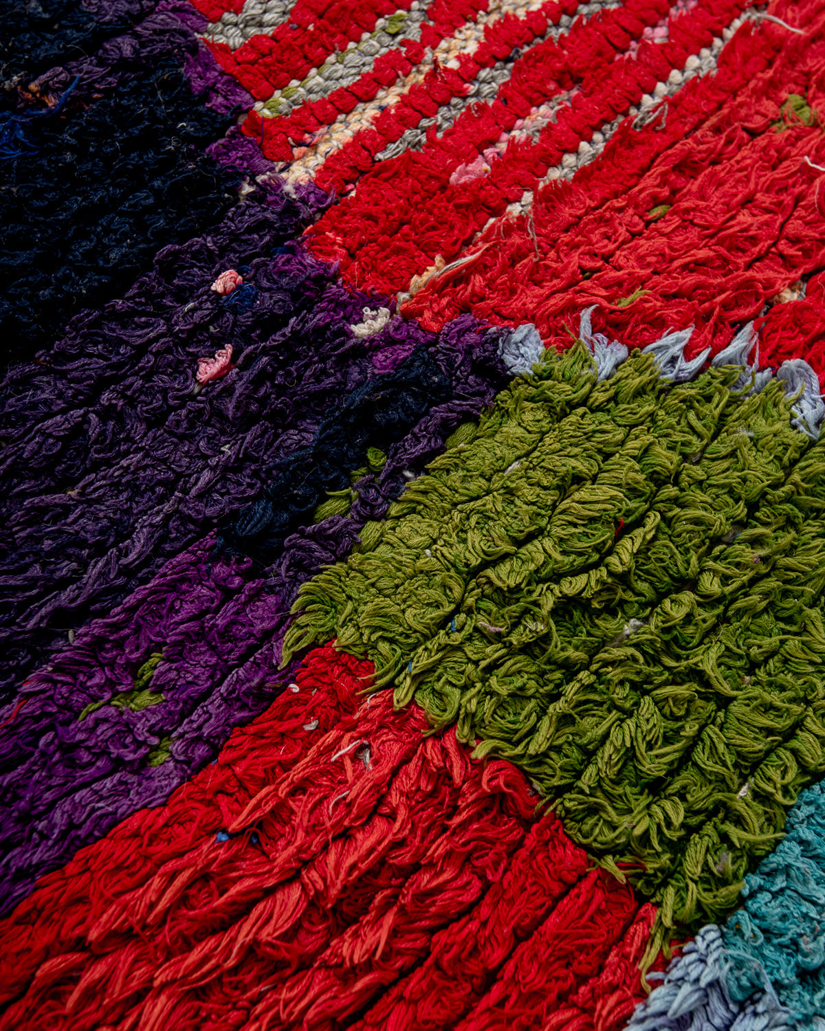 Modern designer vintage handcrafted Berber rug from Morocco. Boucherouite runner rug with beautiful colors and patterns.