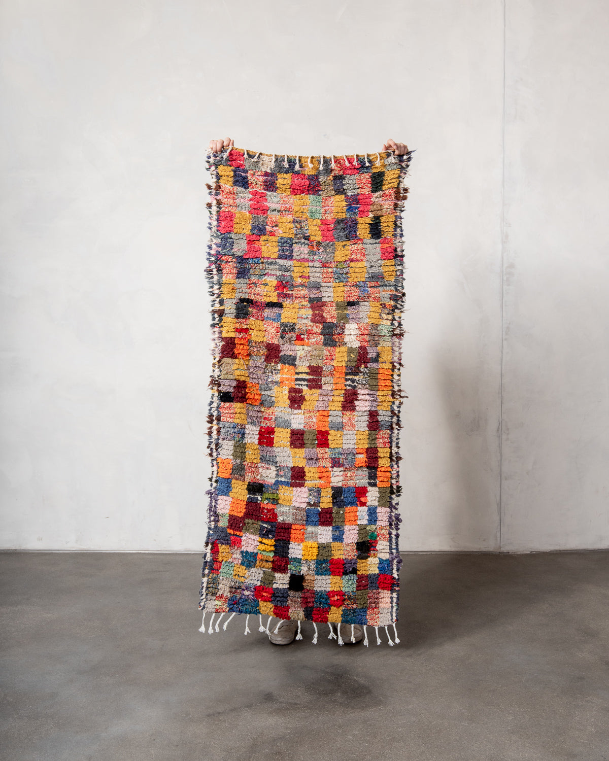 Modern designer vintage handcrafted Berber rug from Morocco. Boucherouite runner rug with beautiful colors and patterns.