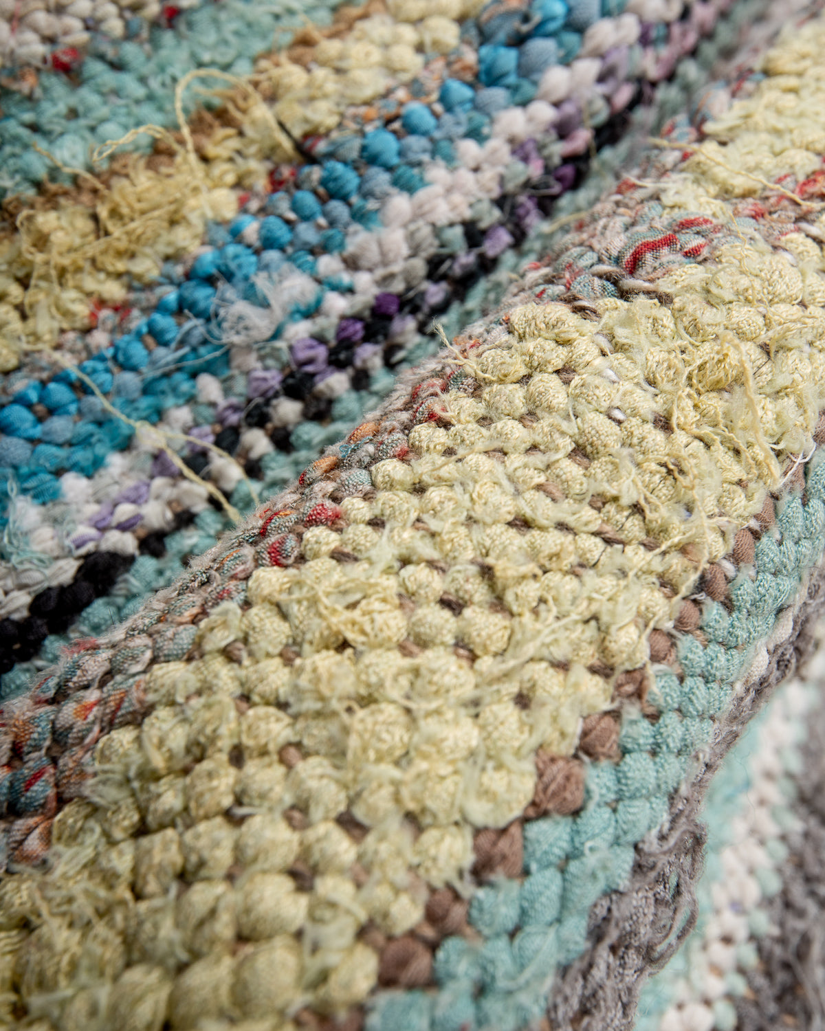 Modern designer vintage handcrafted Berber rug from Morocco. Boucherouite runner rug with beautiful colors and patterns.