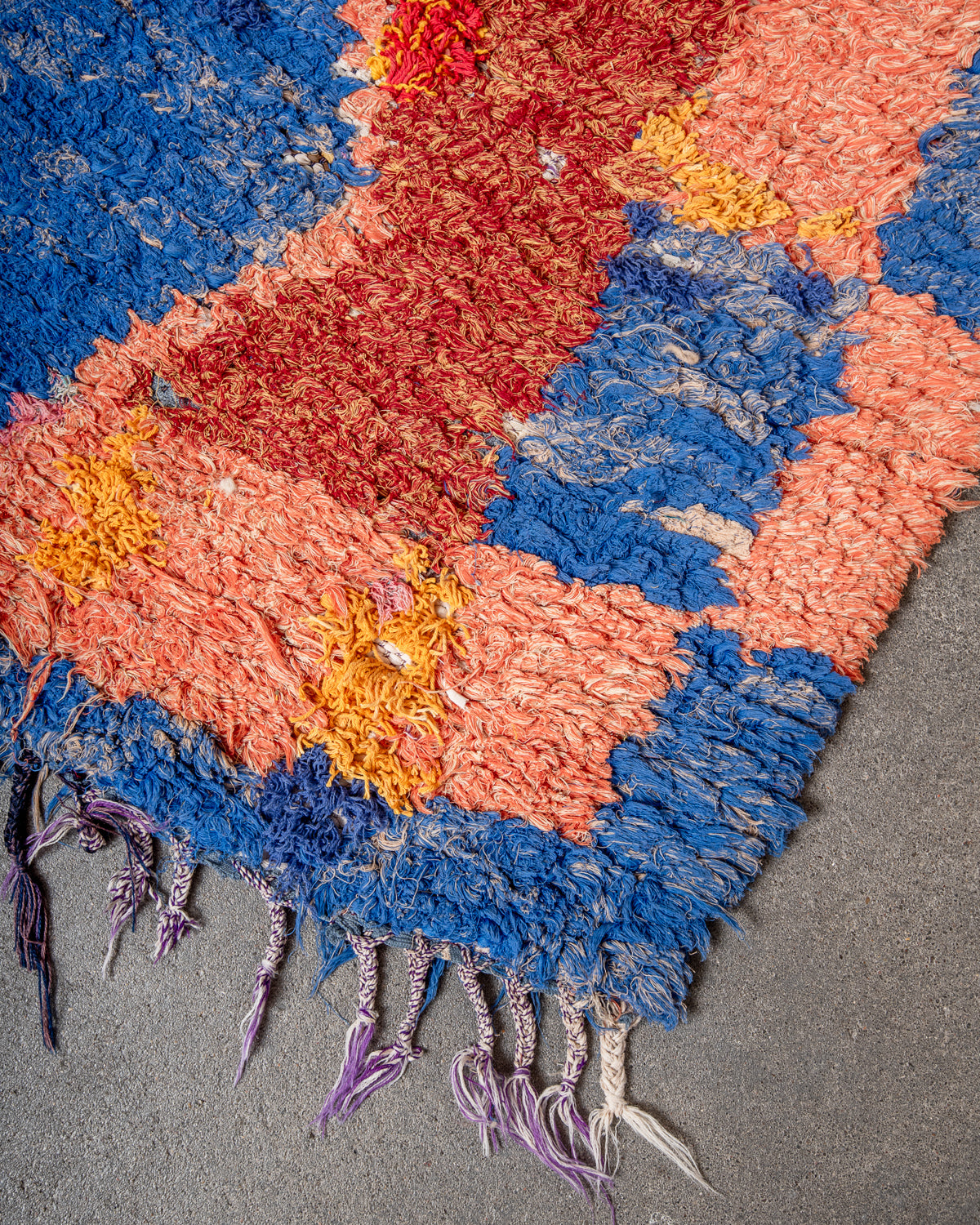 Modern designer vintage handcrafted Berber rug from Morocco. Boucherouite runner rug with beautiful colors and patterns.