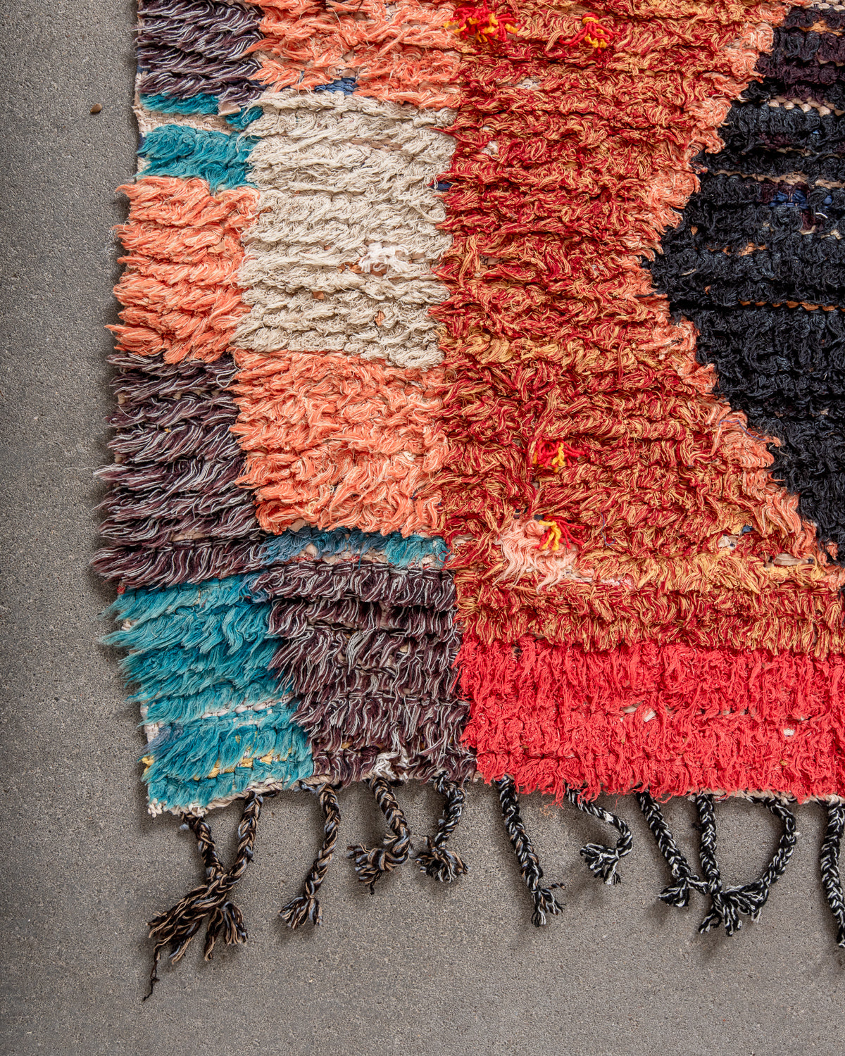 Modern designer vintage handcrafted Berber rug from Morocco. Boucherouite runner rug with beautiful colors and patterns.