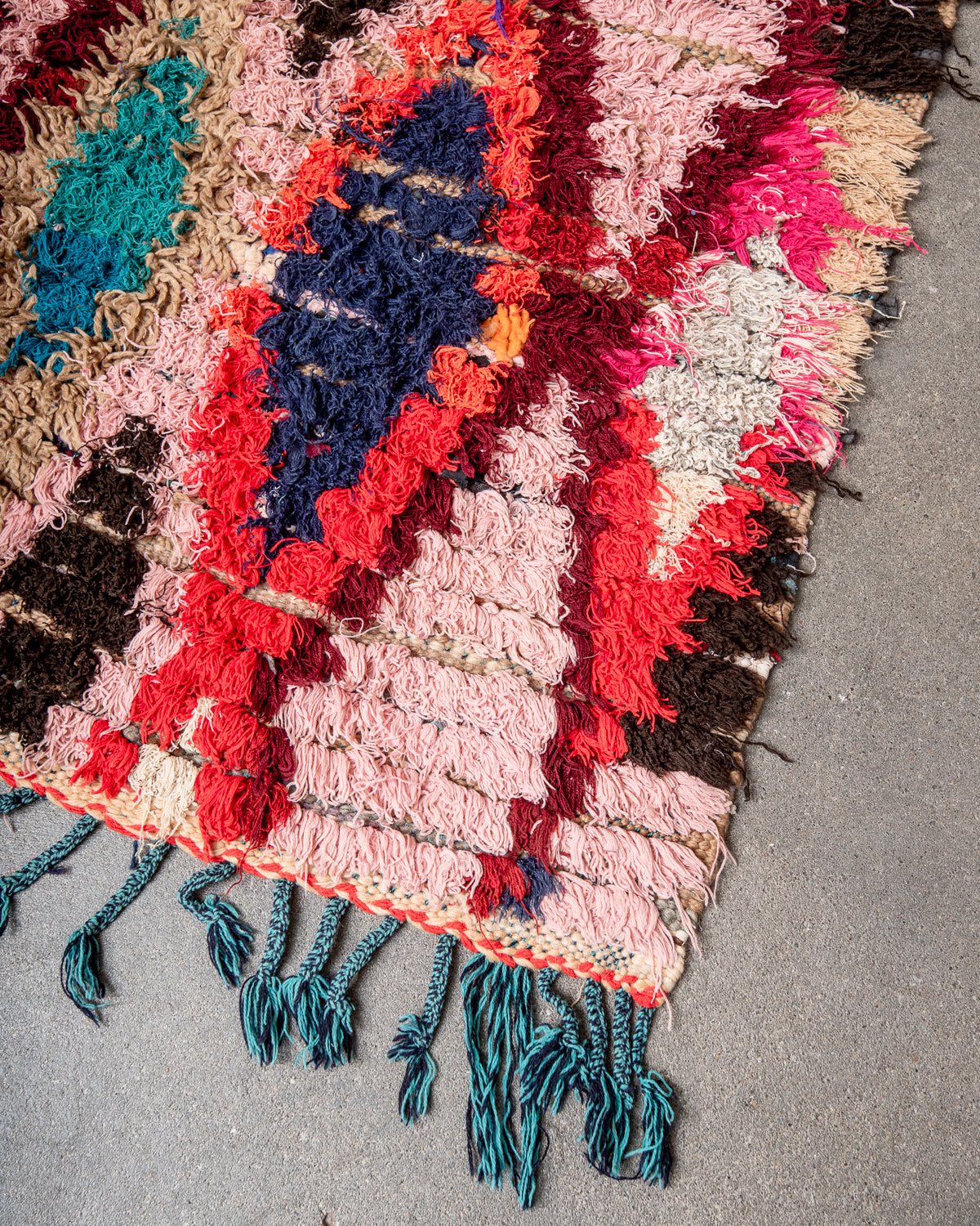 Modern designer vintage handcrafted Berber rug from Morocco. Boucherouite runner rug with beautiful colors and patterns.