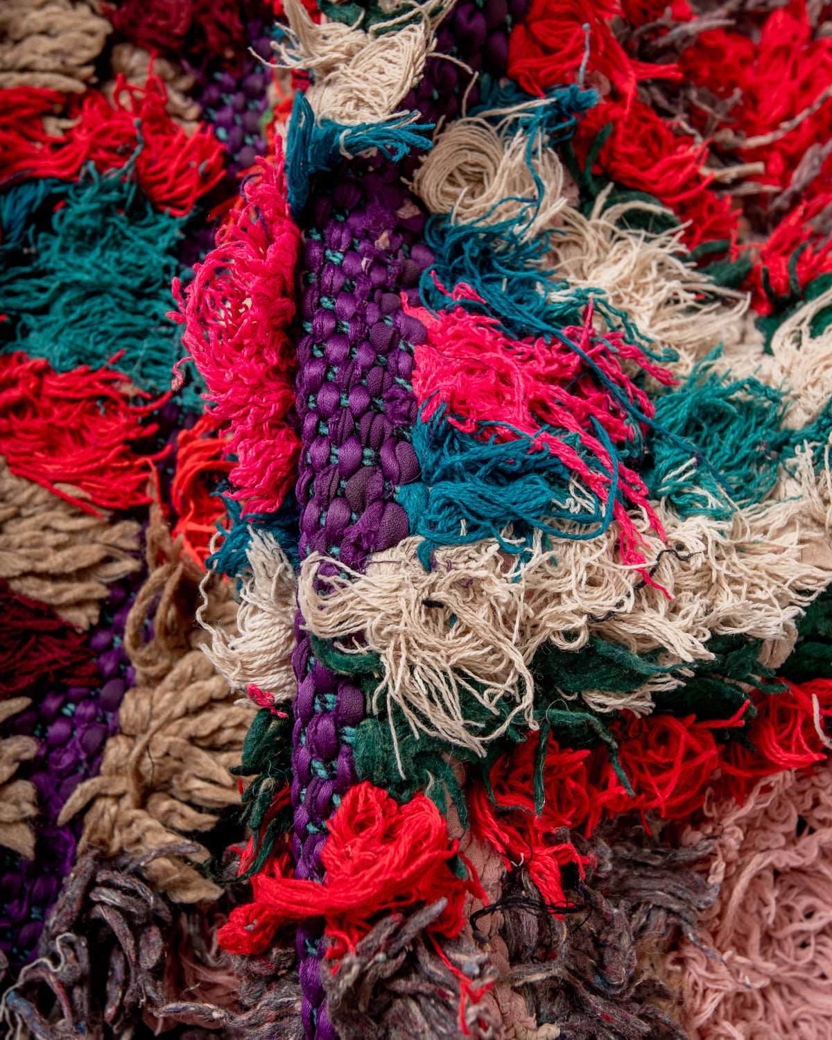 Modern designer vintage handcrafted Berber rug from Morocco. Boucherouite runner rug with beautiful colors and patterns.