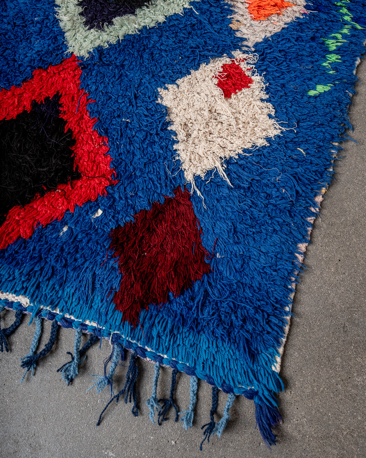 Modern designer vintage handcrafted Berber rug from Morocco. Boucherouite runner rug with beautiful colors and patterns.