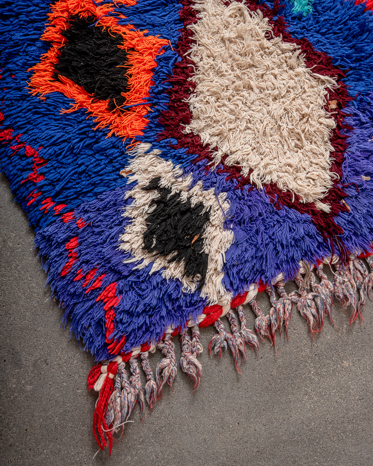 Modern designer vintage handcrafted Berber rug from Morocco. Boucherouite runner rug with beautiful colors and patterns.