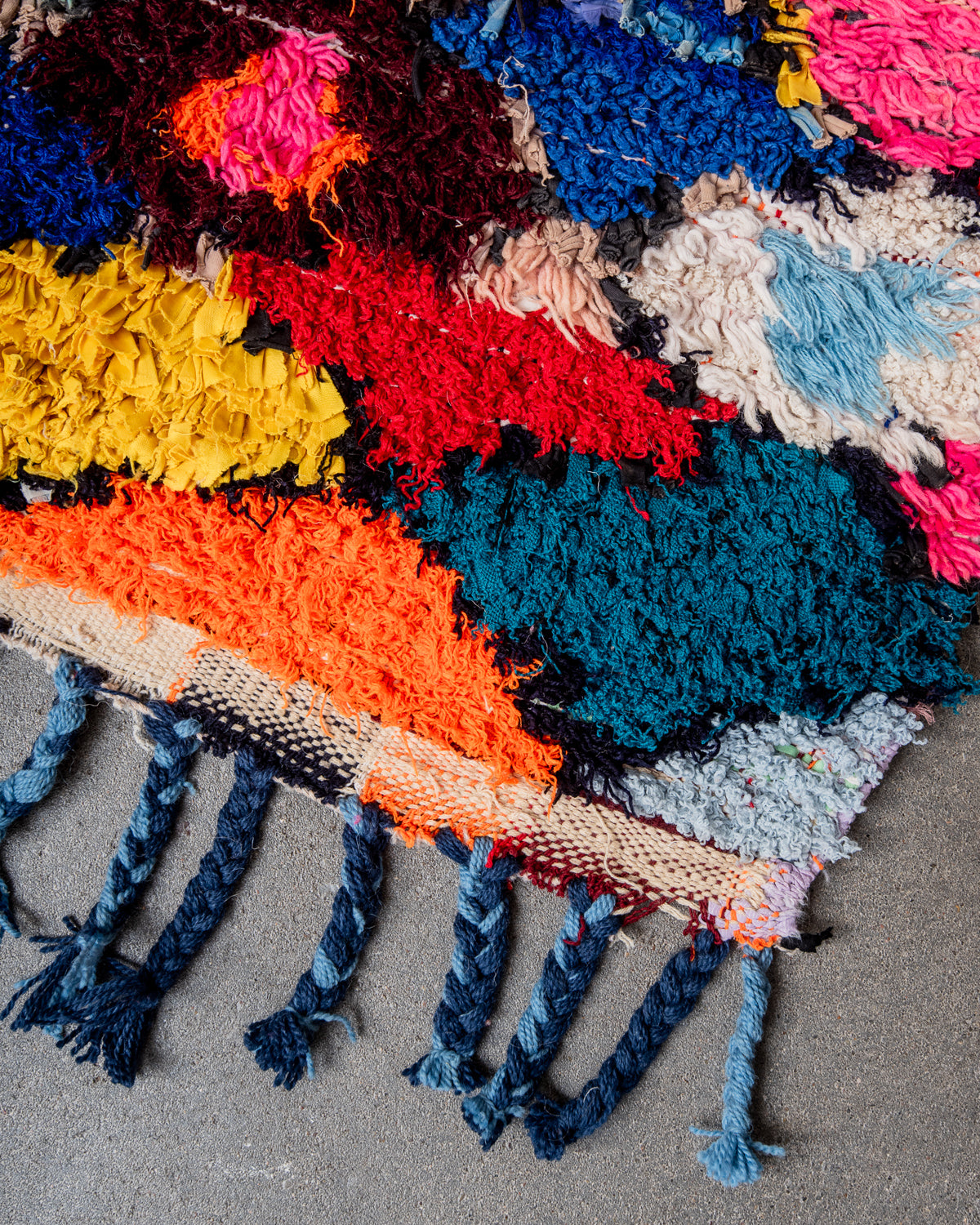 Modern designer vintage handcrafted Berber rug from Morocco. Boucherouite runner rug with beautiful colors and patterns.