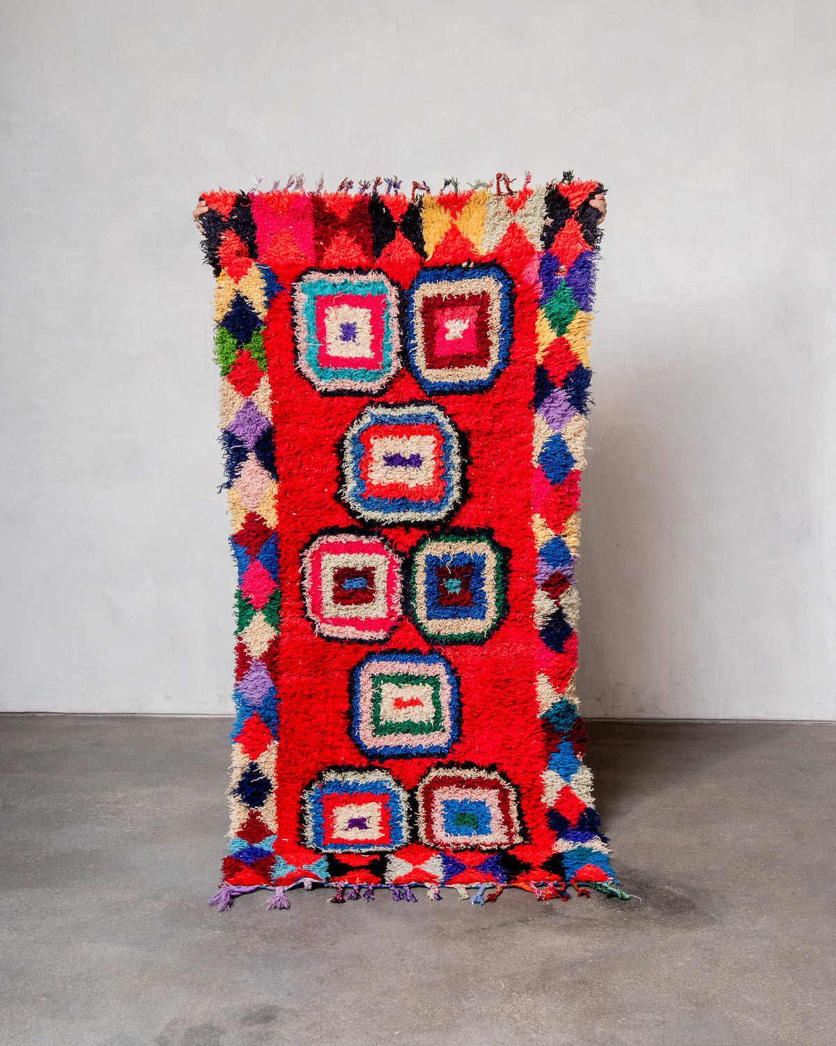 Modern designer vintage handcrafted Berber rug from Morocco. Boucherouite runner rug with beautiful colors and patterns.