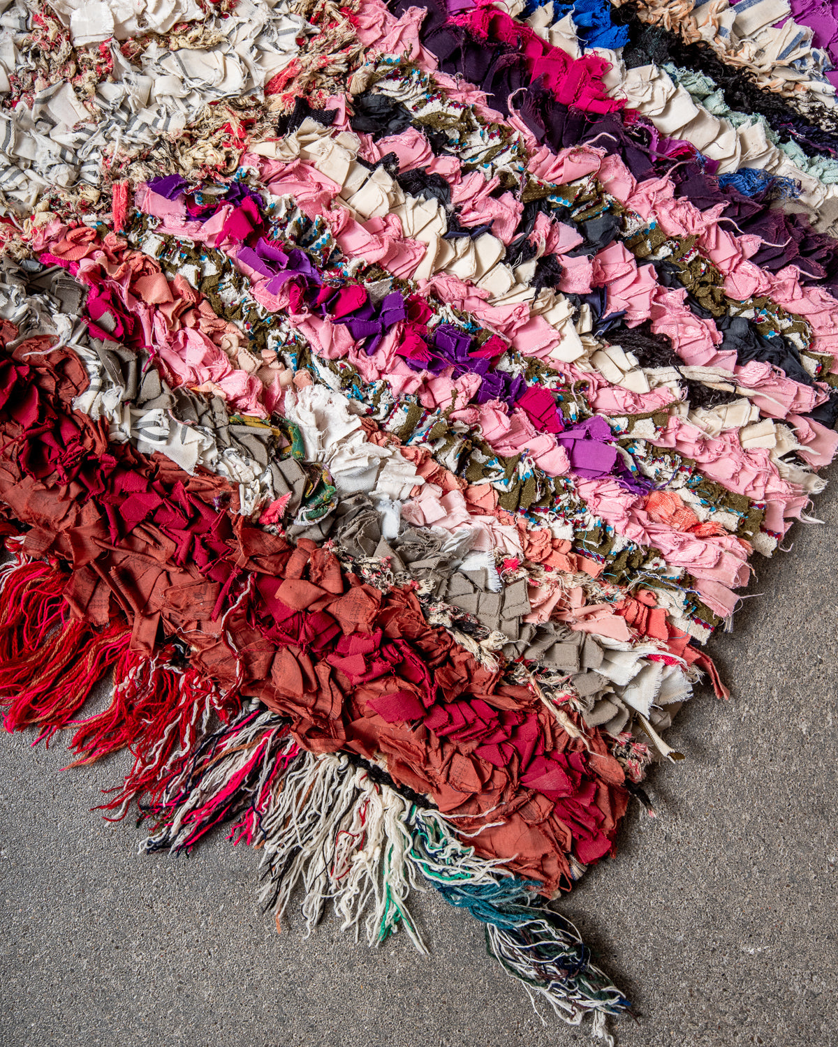 Modern designer vintage handcrafted Berber rug from Morocco. Boucherouite runner rug with beautiful colors and patterns.