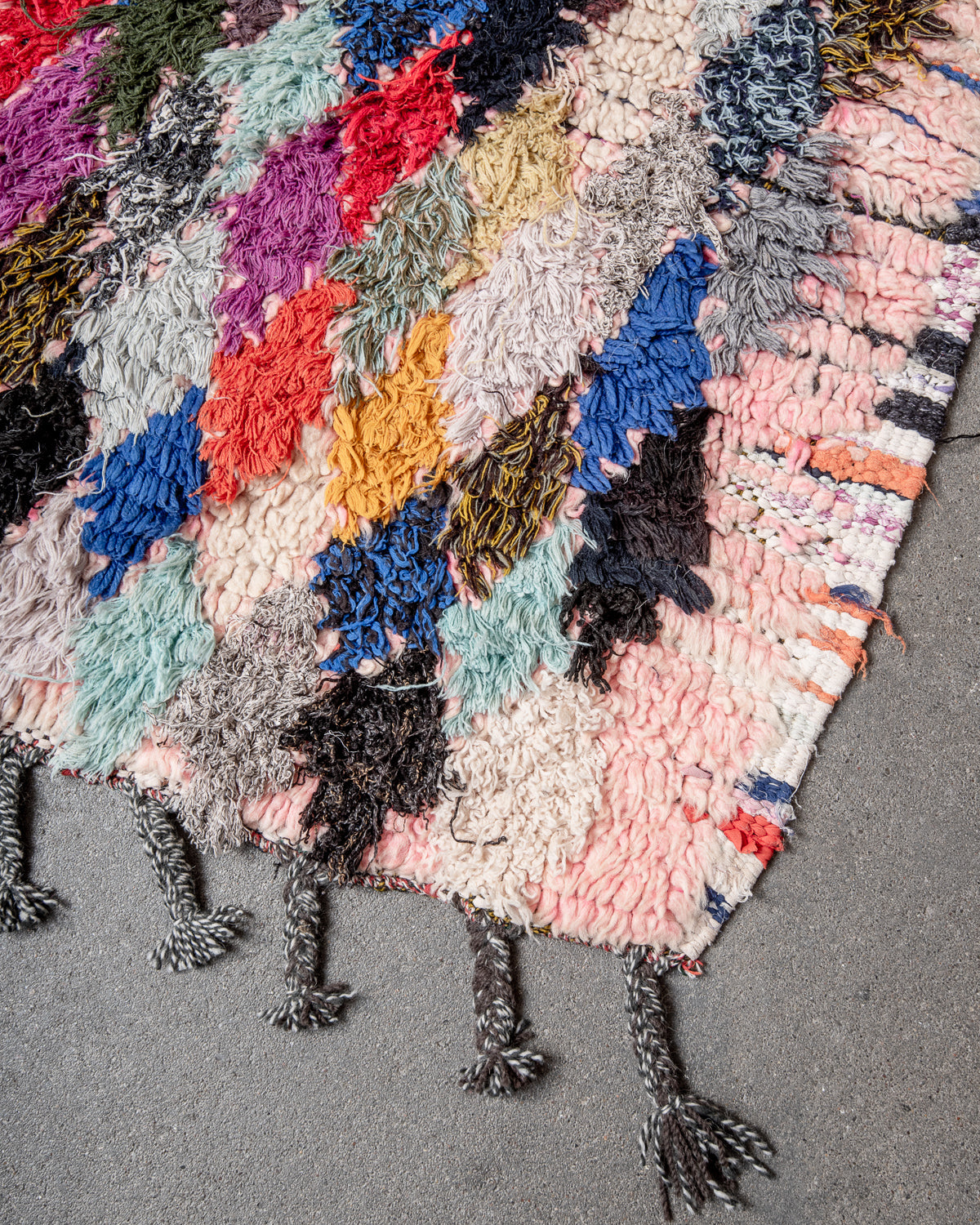 Modern designer vintage handcrafted Berber rug from Morocco. Boucherouite runner rug with beautiful colors and patterns.