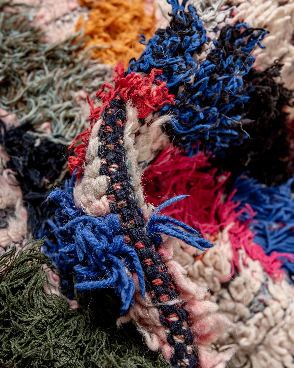 Modern designer vintage handcrafted Berber rug from Morocco. Boucherouite runner rug with beautiful colors and patterns.