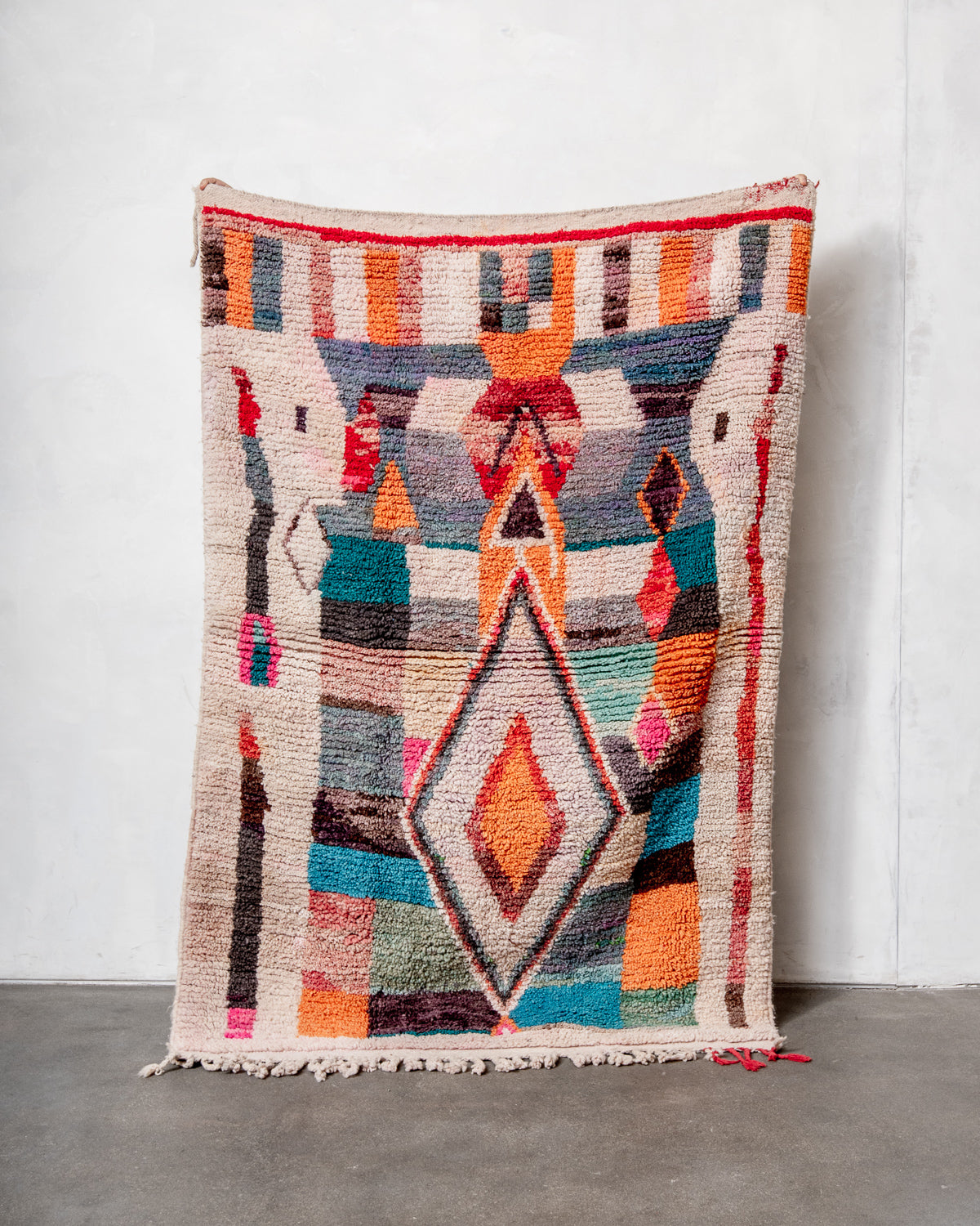 Modern, designer, handcrafted Berber rug from Morocco. Vintage carpet with beautiful colours and patterns and fluffy texture.