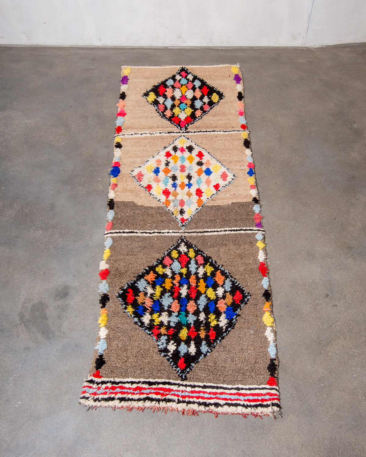 Modern, designer, handcrafted Berber runner rug from Morocco. Vintage carpet with beautiful colours and patterns and fluffy texture.