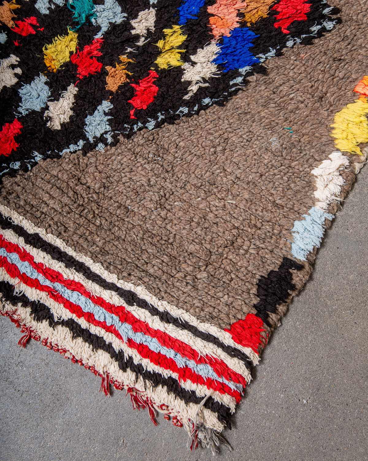 Modern, designer, handcrafted Berber runner rug from Morocco. Vintage carpet with beautiful colours and patterns and fluffy texture.