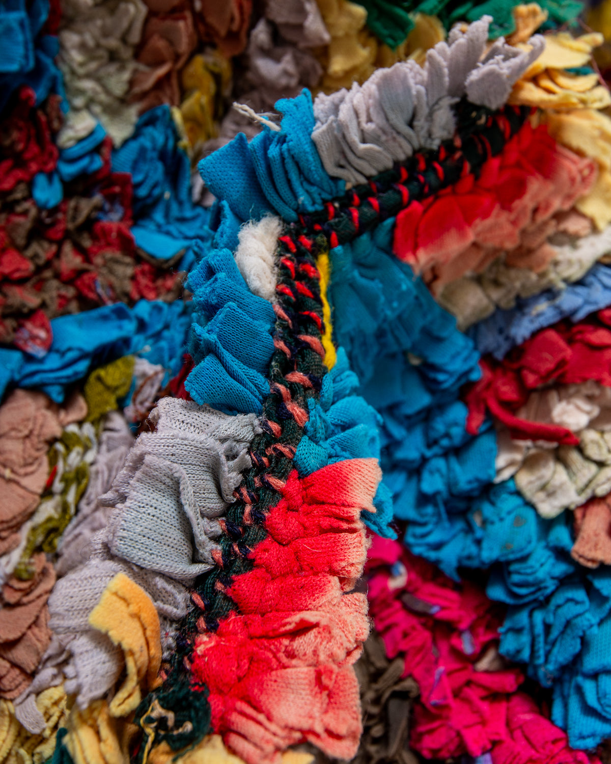 Modern designer vintage handcrafted Berber rug from Morocco. Boucherouite runner rug with beautiful colors and patterns.