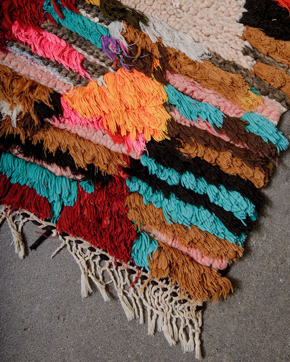 Modern designer vintage handcrafted Berber rug from Morocco. Boucherouite runner rug with beautiful colors and patterns.
