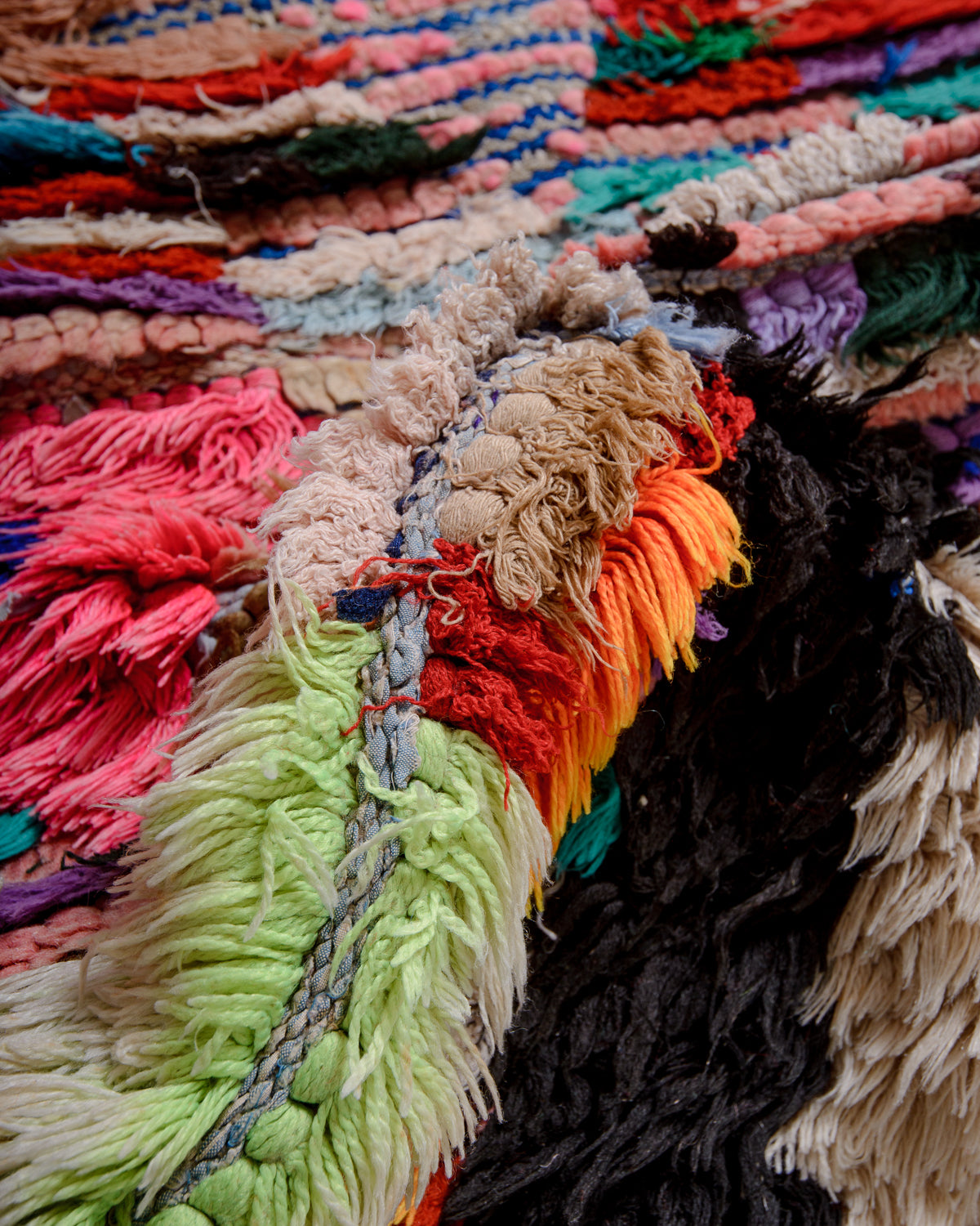 Modern designer vintage handcrafted Berber rug from Morocco. Boucherouite runner rug with beautiful colors and patterns.