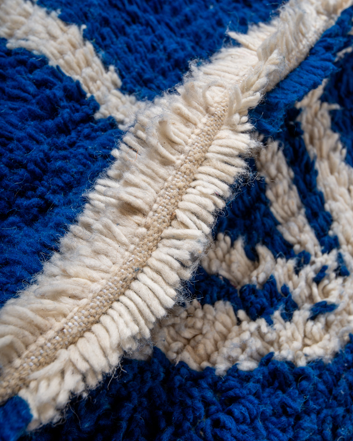 Modern designer handcrafted Berber rug from Morocco. Azilal rug with beautiful colours and patterns. Made of sheep’s wool and colourful cotton.