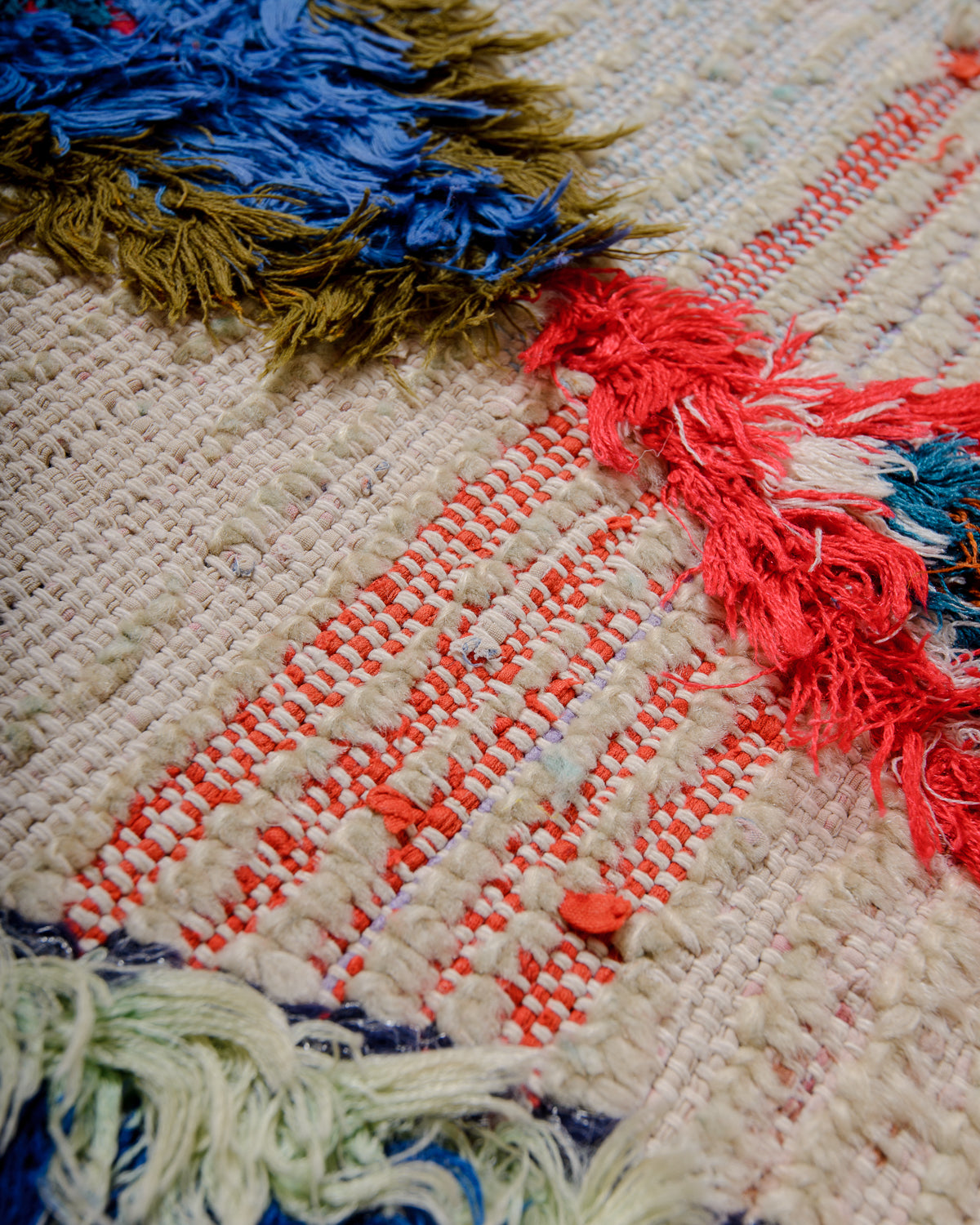 Modern designer vintage handcrafted Berber rug from Morocco. Boucherouite runner rug with beautiful colors and patterns.