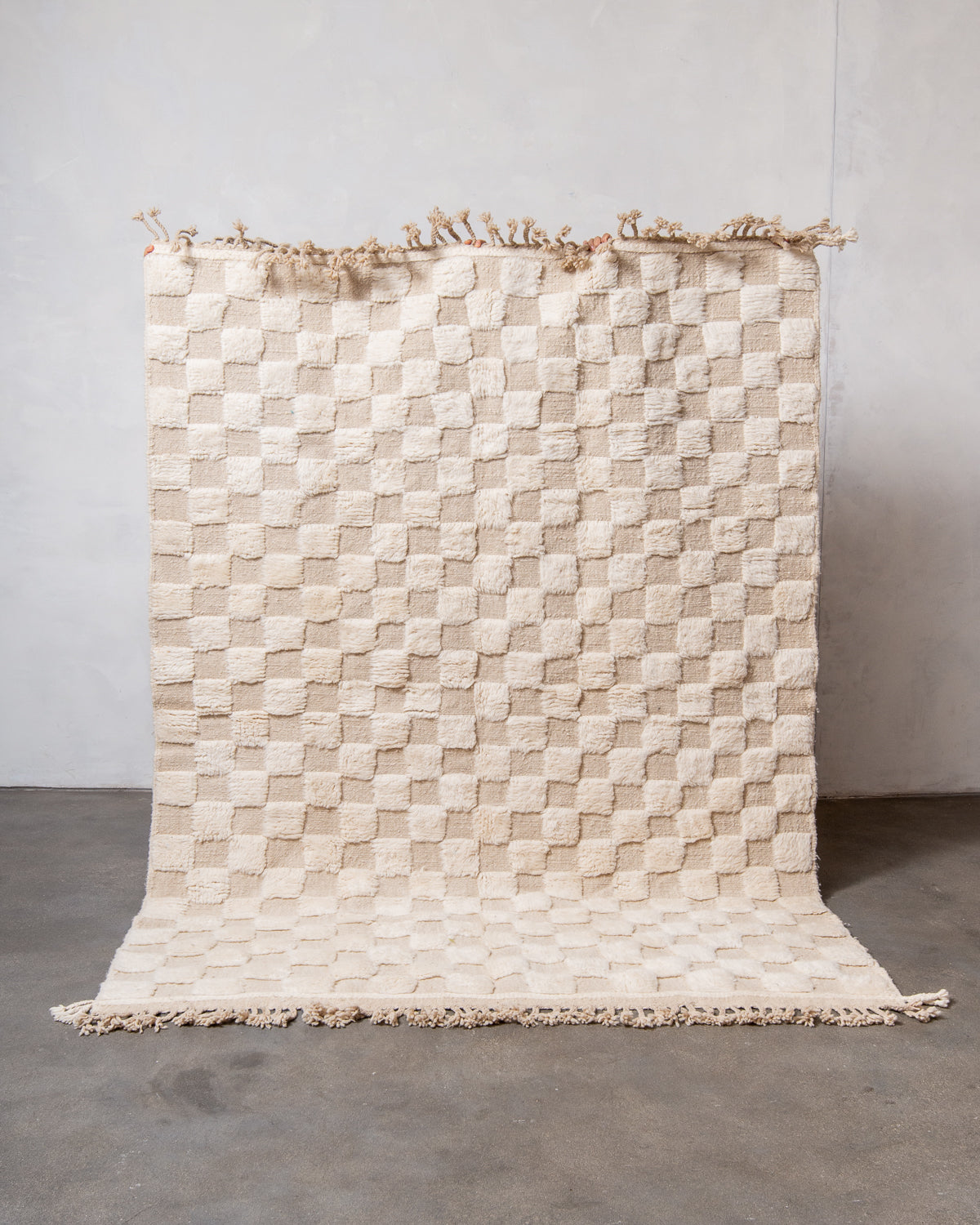 Modern, designer, handcrafted Berber rug from Morocco. Beniourain carpet with minimalist design, natural wool pile and a fluffy texture.