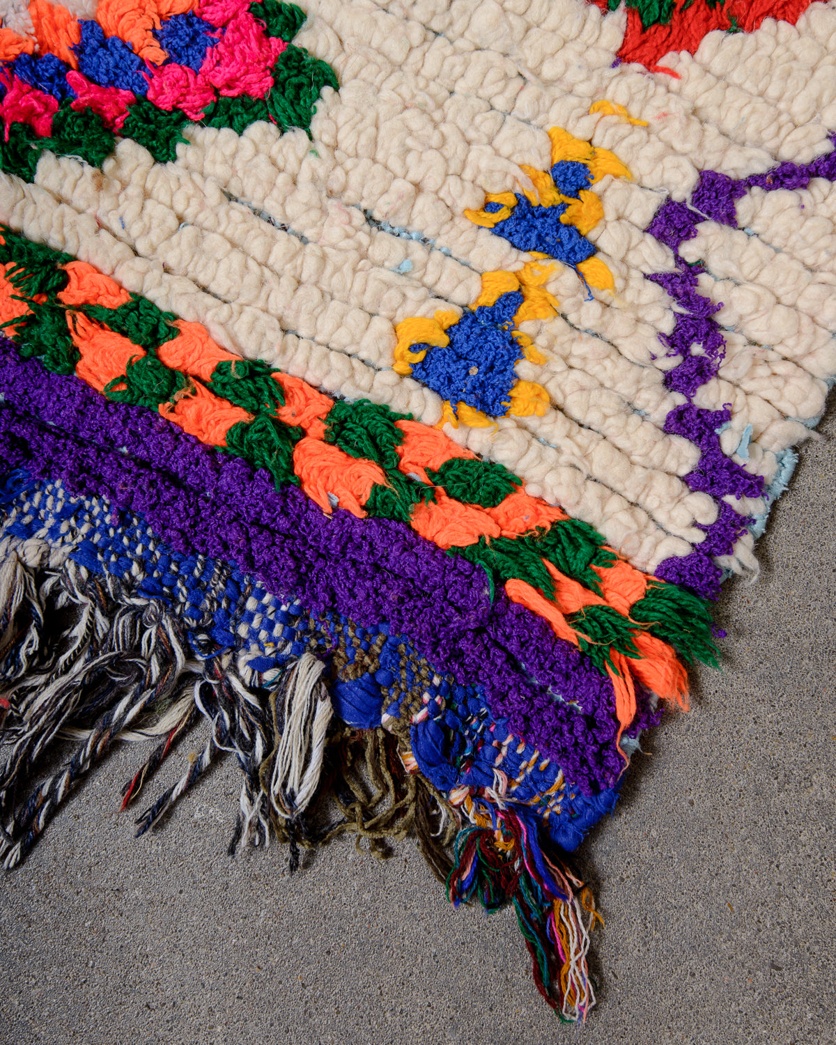 Modern designer vintage handcrafted Berber rug from Morocco. Boucherouite runner rug with beautiful colors and patterns.