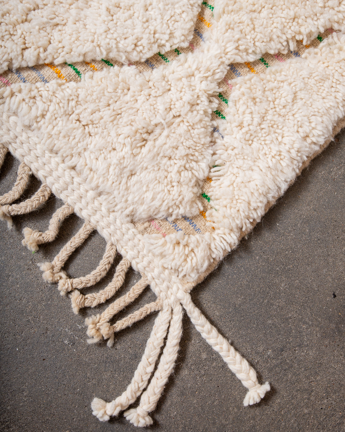 Modern, designer, handcrafted Berber rug from Morocco. Beniourain carpet with minimalist design, natural wool pile and a fluffy texture.
