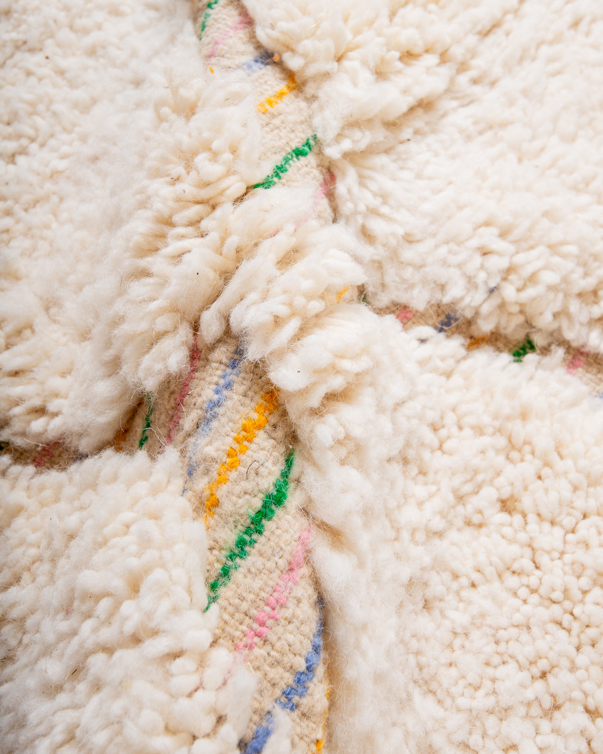 Modern, designer, handcrafted Berber rug from Morocco. Beniourain carpet with minimalist design, natural wool pile and a fluffy texture.