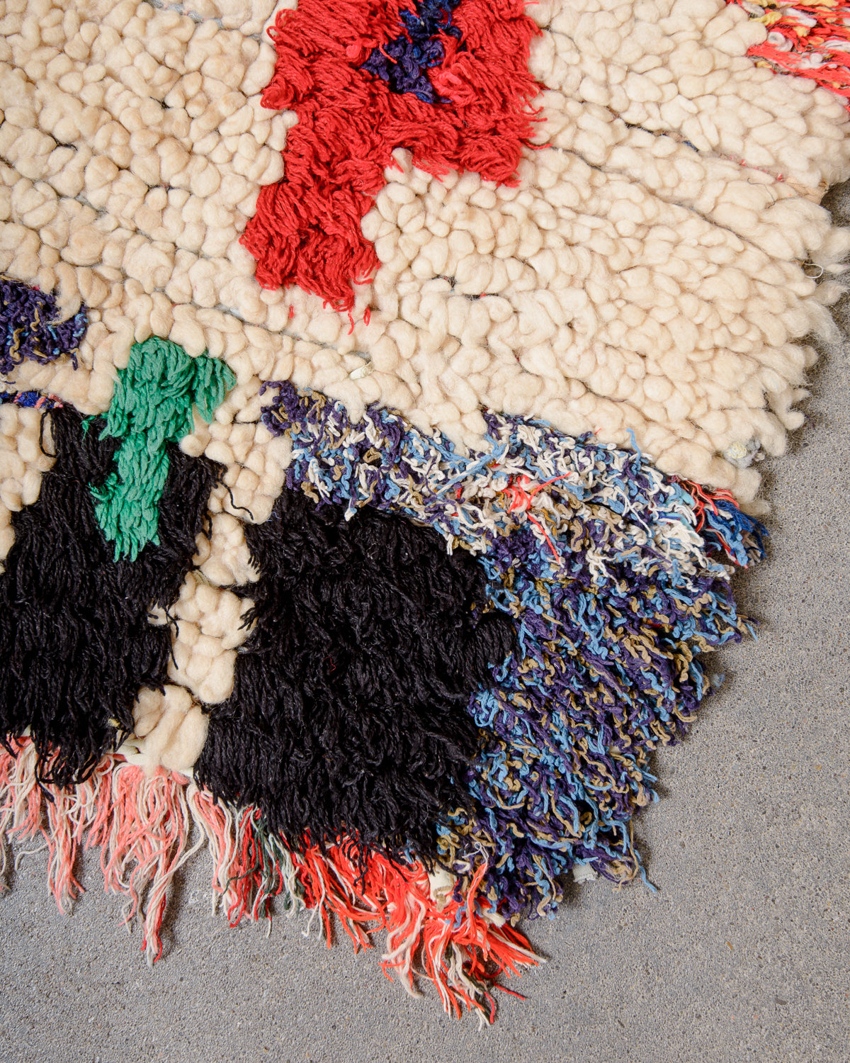 Modern designer vintage handcrafted Berber rug from Morocco. Boucherouite runner rug with beautiful colors and patterns.