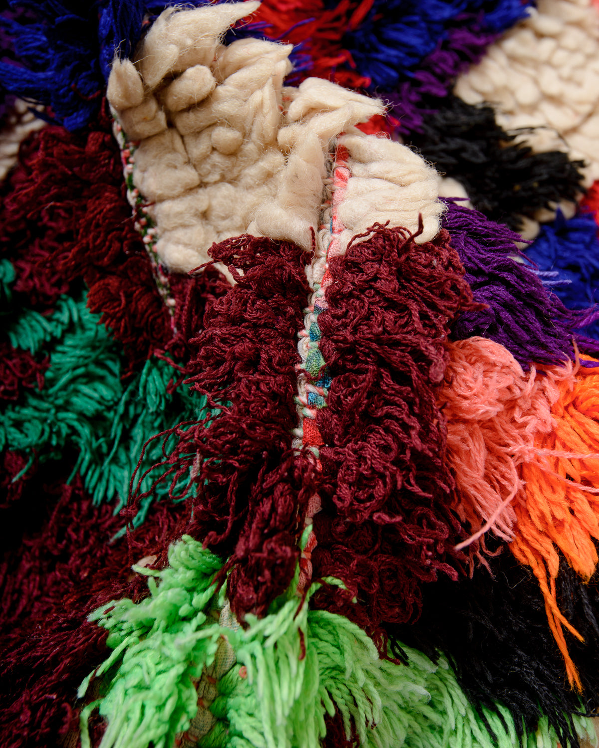 Modern designer vintage handcrafted Berber rug from Morocco. Boucherouite runner rug with beautiful colors and patterns.