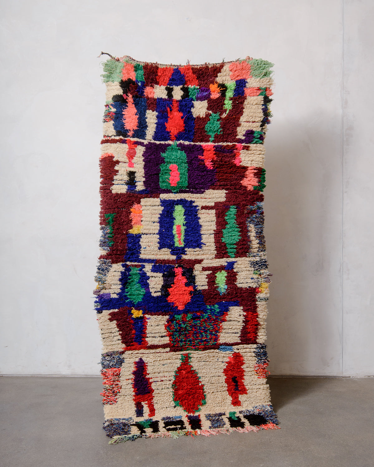 Modern designer vintage handcrafted Berber rug from Morocco. Boucherouite runner rug with beautiful colors and patterns.