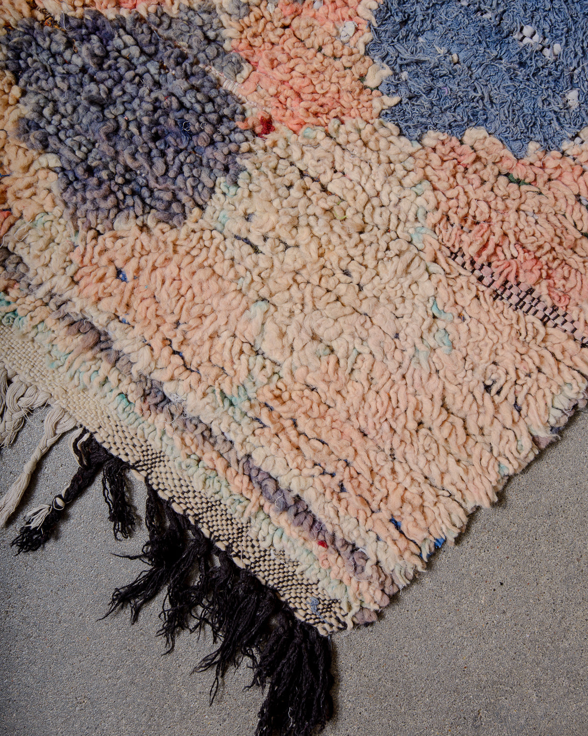 Modern designer vintage handcrafted Berber rug from Morocco. Boucherouite runner rug with beautiful colors and patterns.