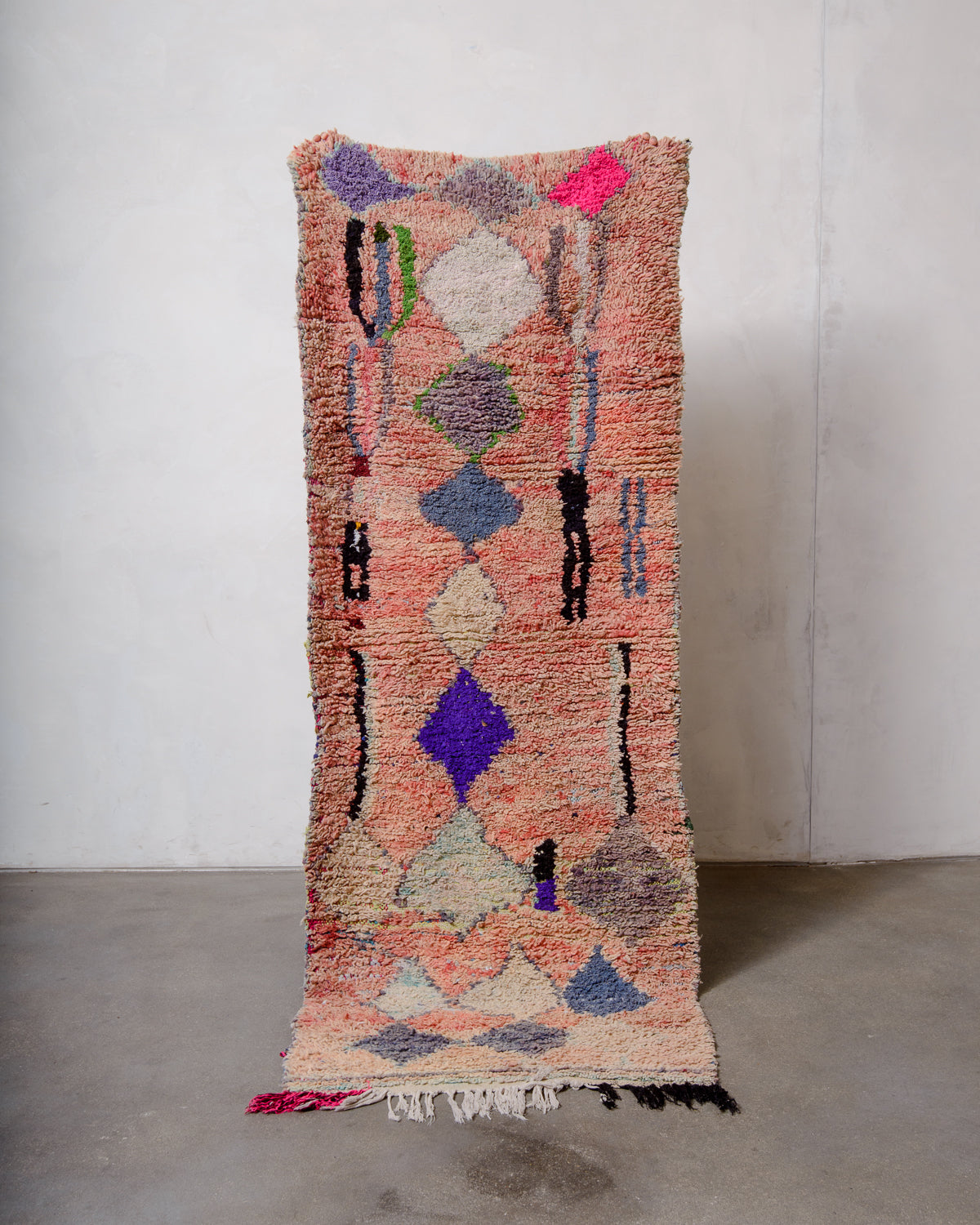 Modern designer vintage handcrafted Berber rug from Morocco. Boucherouite runner rug with beautiful colors and patterns.